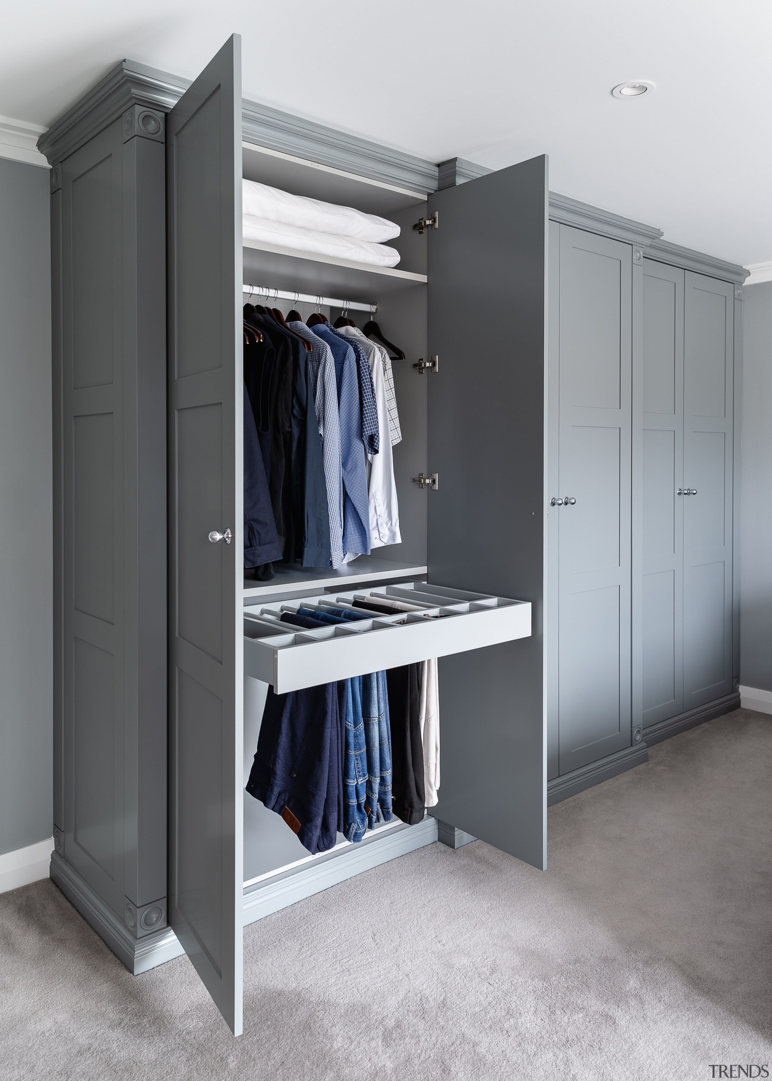 The master bedroom’s bespoke wardrobes were designed so 