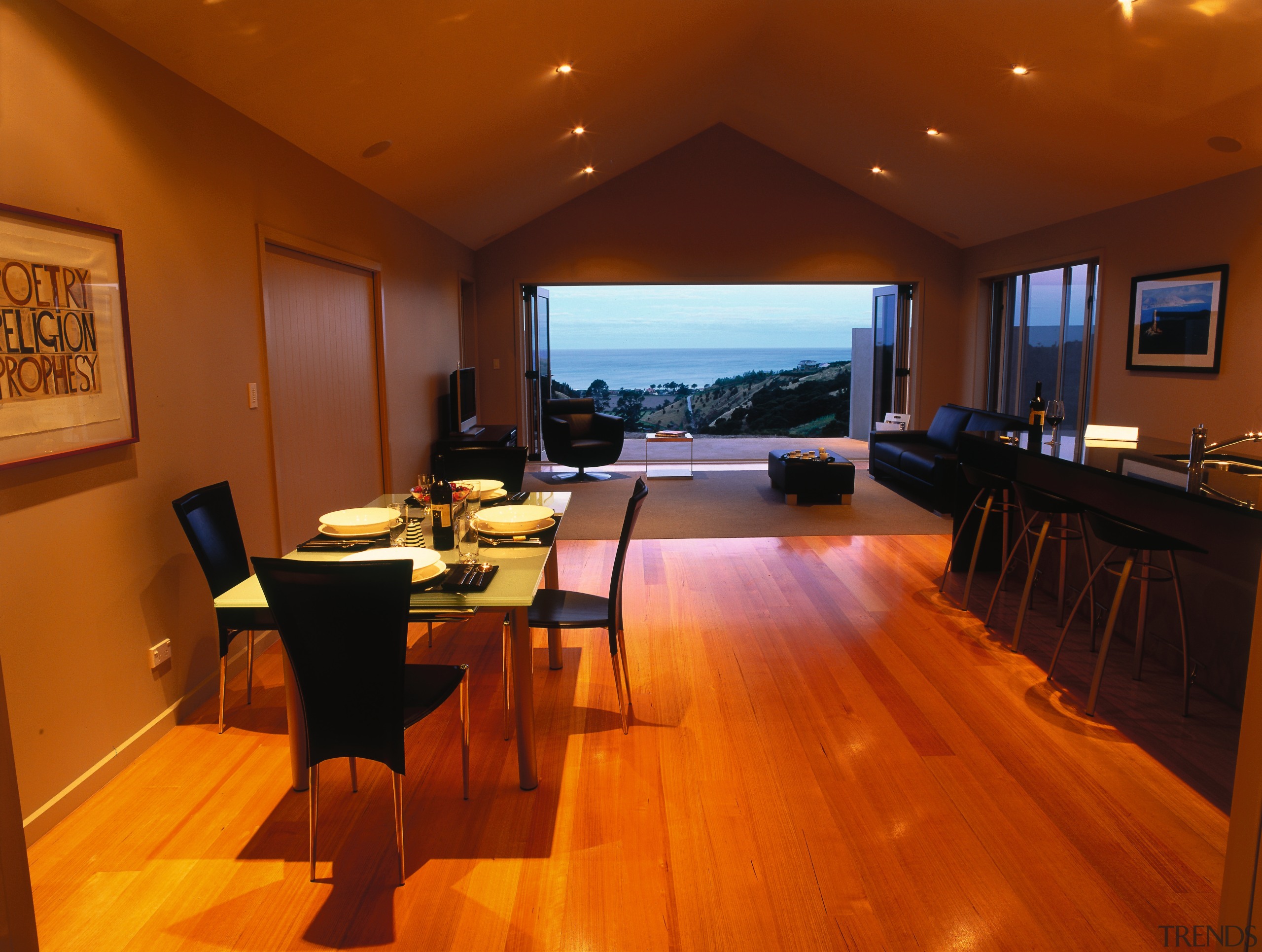 A view of a home constructed by Advantage ceiling, dining room, floor, flooring, hardwood, interior design, living room, real estate, room, table, wood, wood flooring, brown