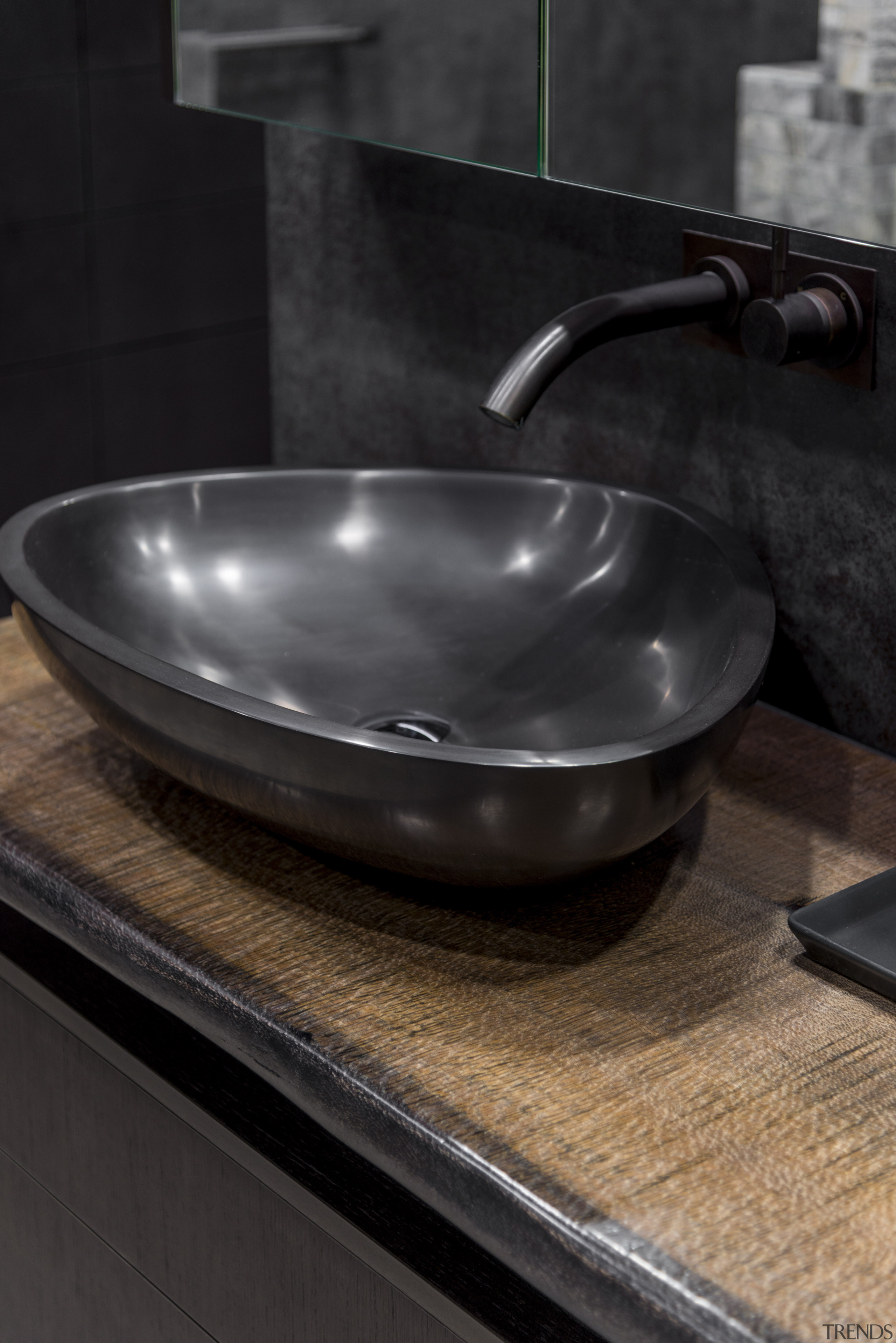 Engineered stone benchtop vessels add to other curved cookware and bakeware, plumbing fixture, sink, black