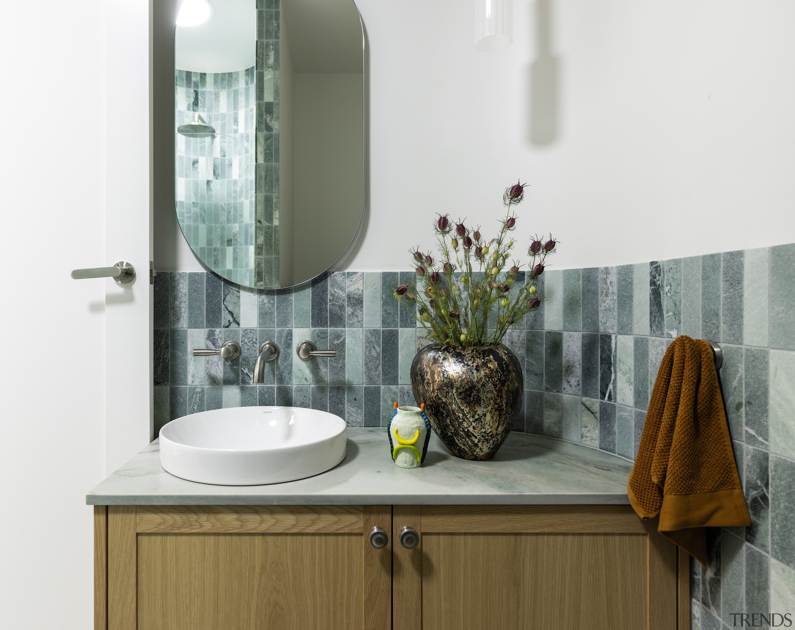 Although compact, the guest ensuite achieves a sense 