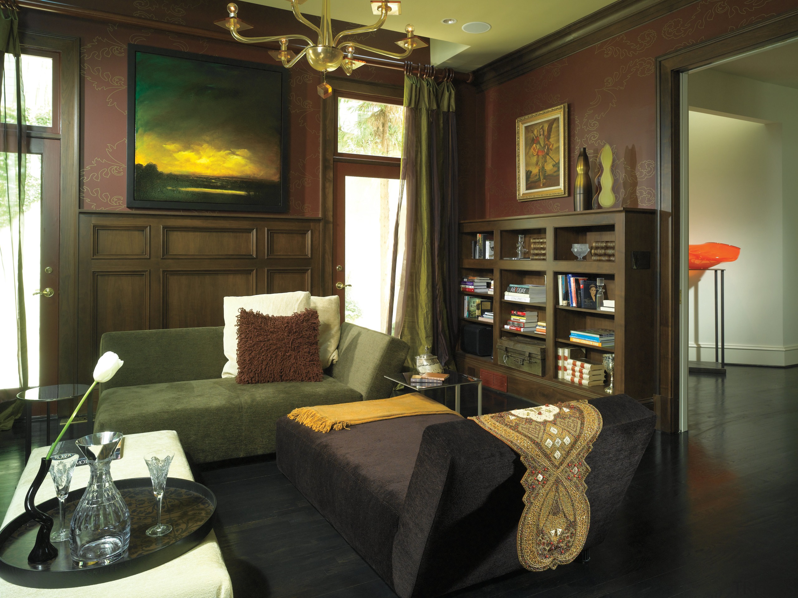 Subtly patterend wallpaper features above the libary's mahogany interior design, living room, real estate, room, brown