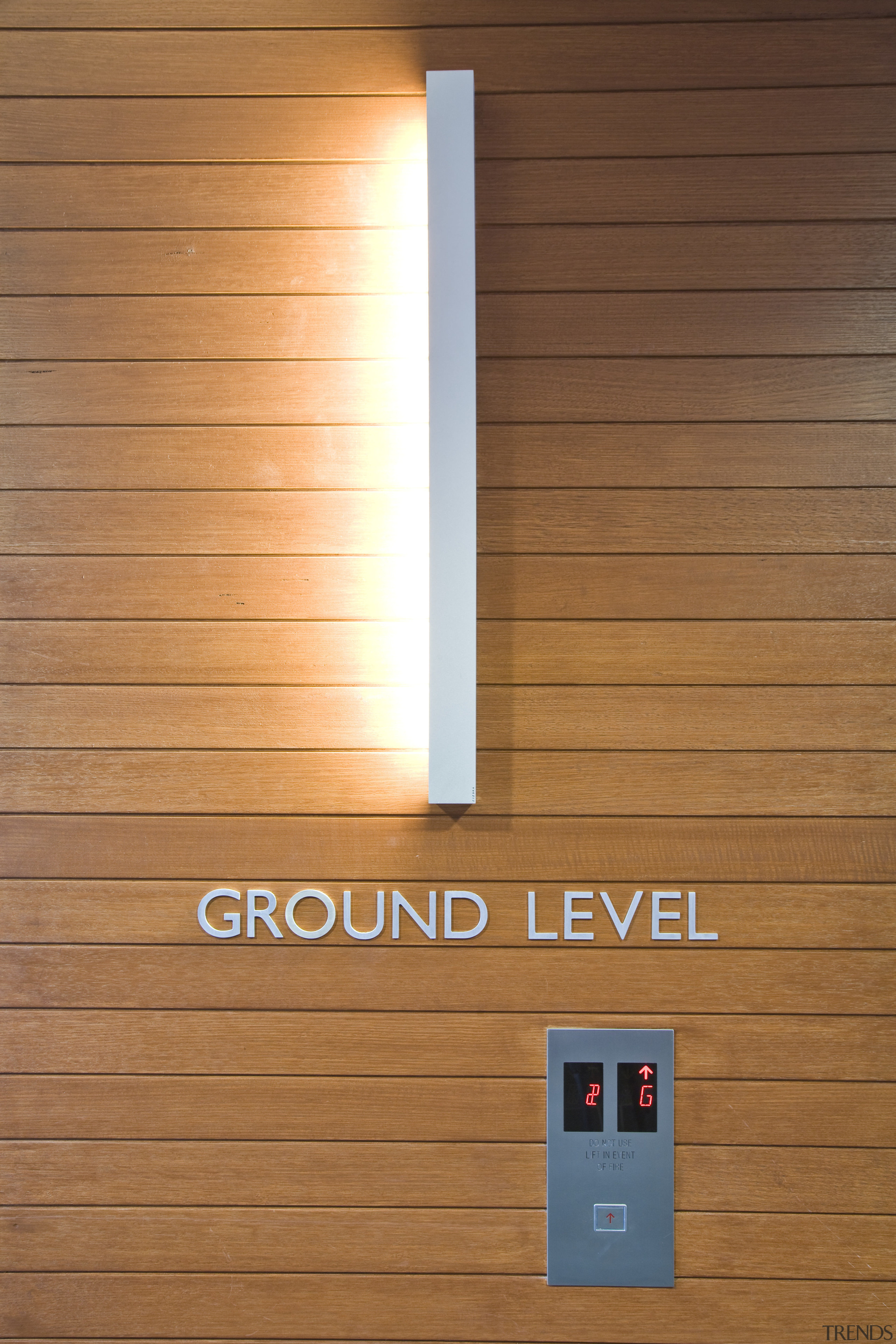 Interior view of the Quest Hotel where they floor, light, lighting, product design, wood, wood stain, brown, orange