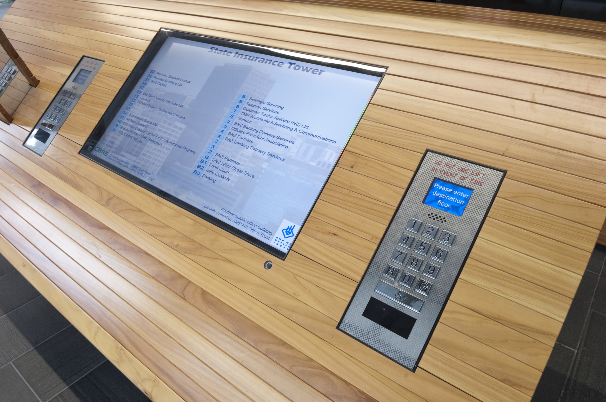 View of a Compass destination entry system from floor, flooring, hardwood, wood, wood stain, orange