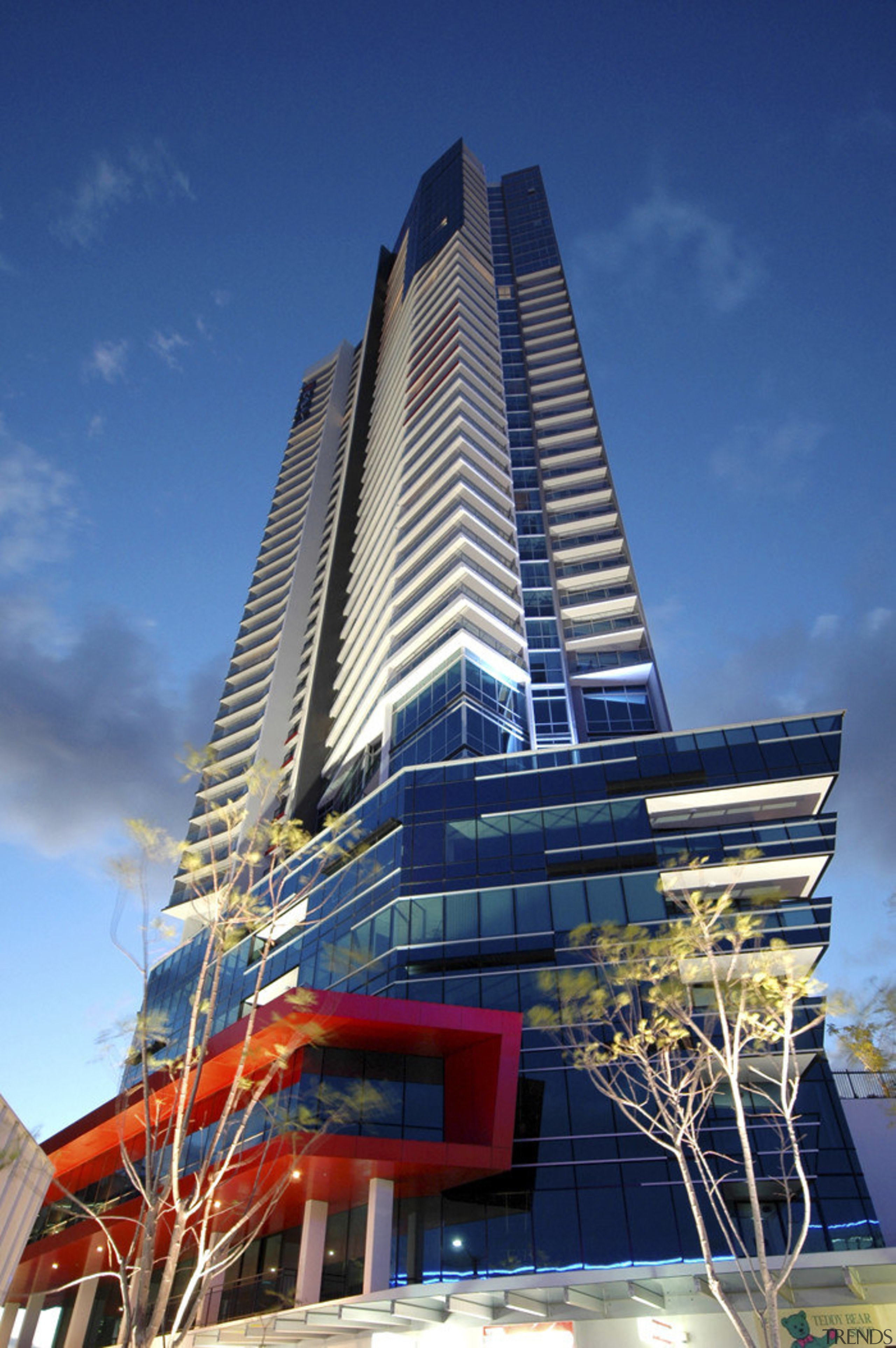 View of a commercial building designed by Archidiom architecture, building, city, commercial building, condominium, corporate headquarters, daytime, facade, headquarters, hotel, landmark, metropolis, metropolitan area, mixed use, real estate, sky, skyscraper, tower, tower block, urban area, blue