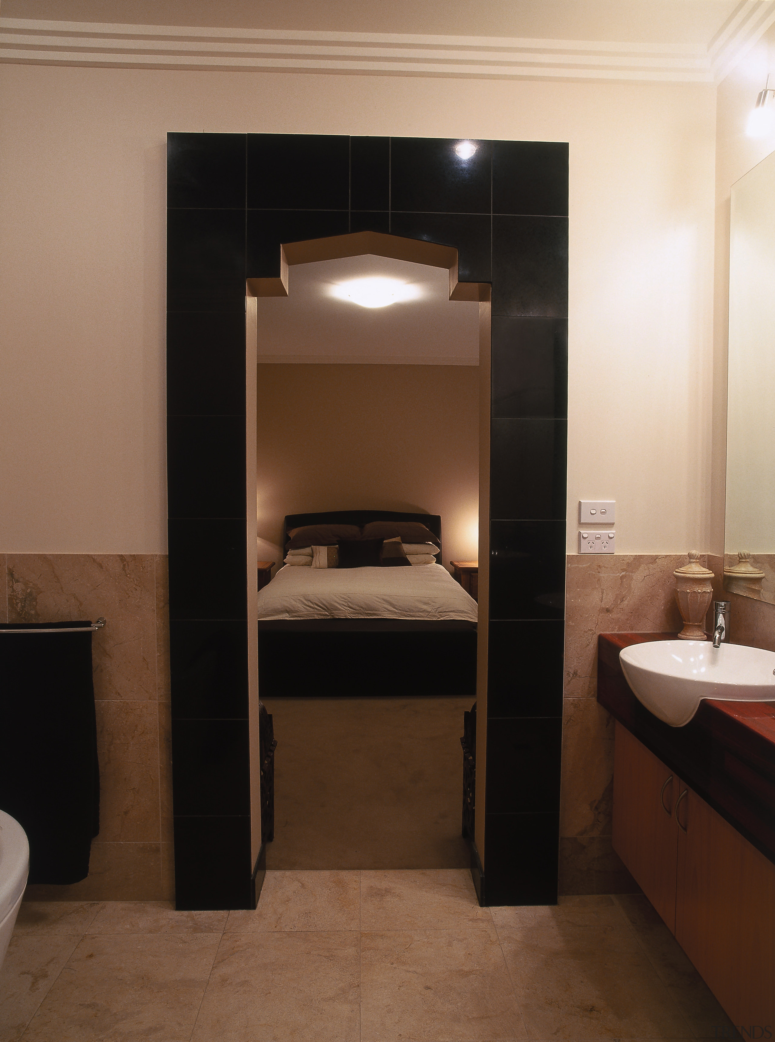 view of the bathroom leading into themaster bedroom bathroom, floor, flooring, interior design, plumbing fixture, room, sink, brown