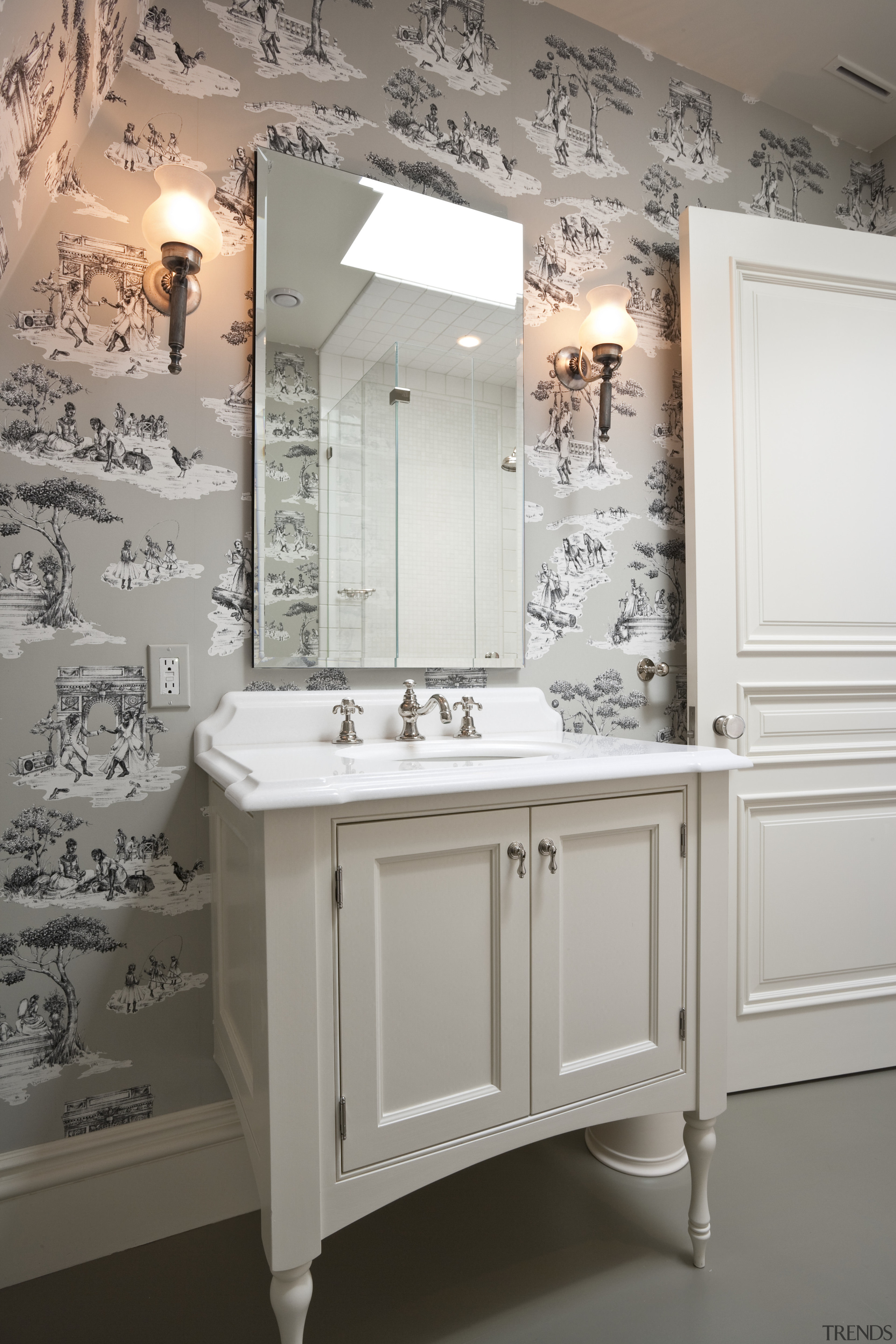 View of a guest bathroom which features a bathroom, bathroom accessory, bathroom cabinet, cabinetry, ceramic, furniture, interior design, plumbing fixture, room, sink, gray