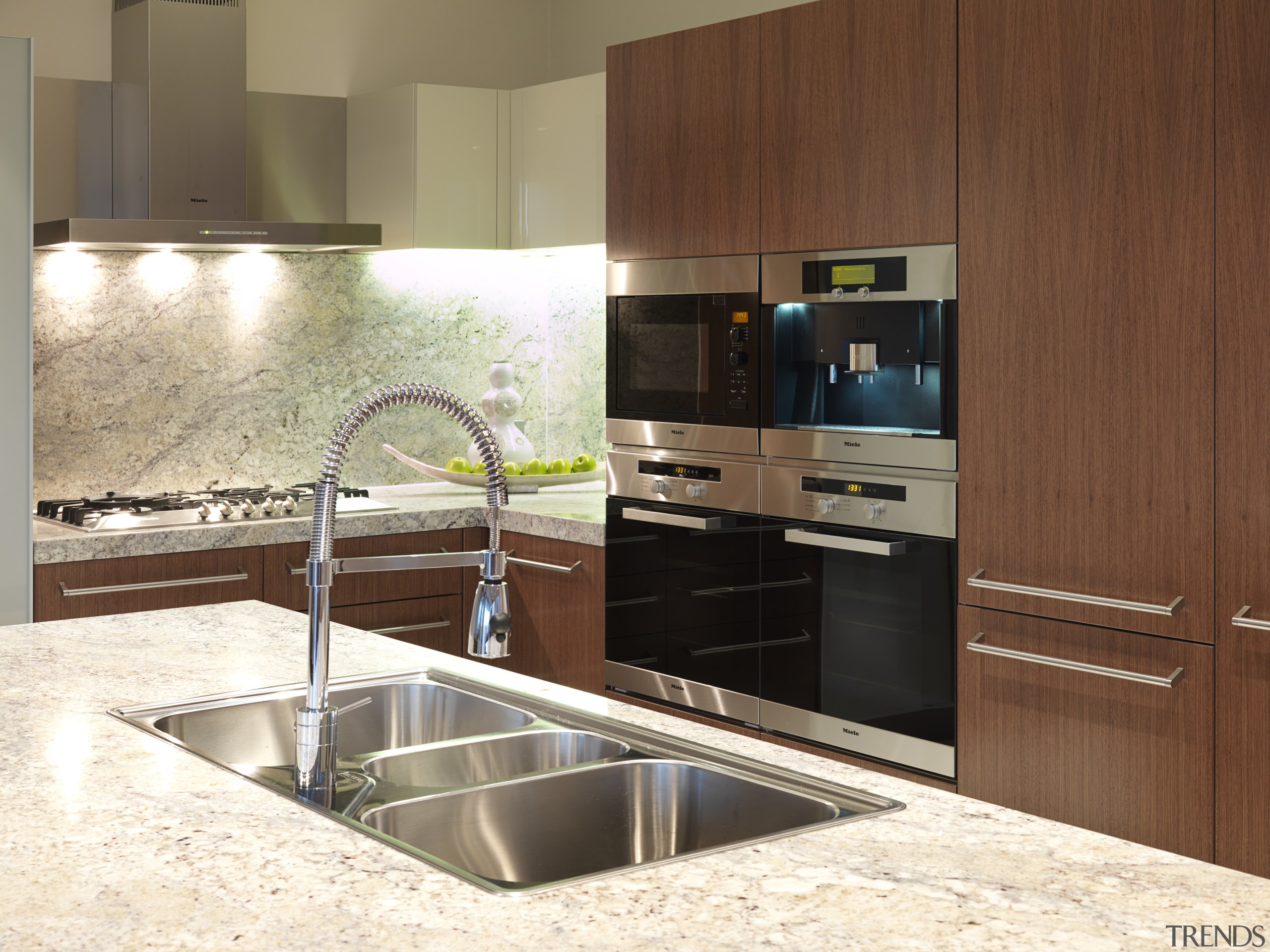 This kitchen in the new Lucient apartments in cabinetry, countertop, interior design, kitchen, brown