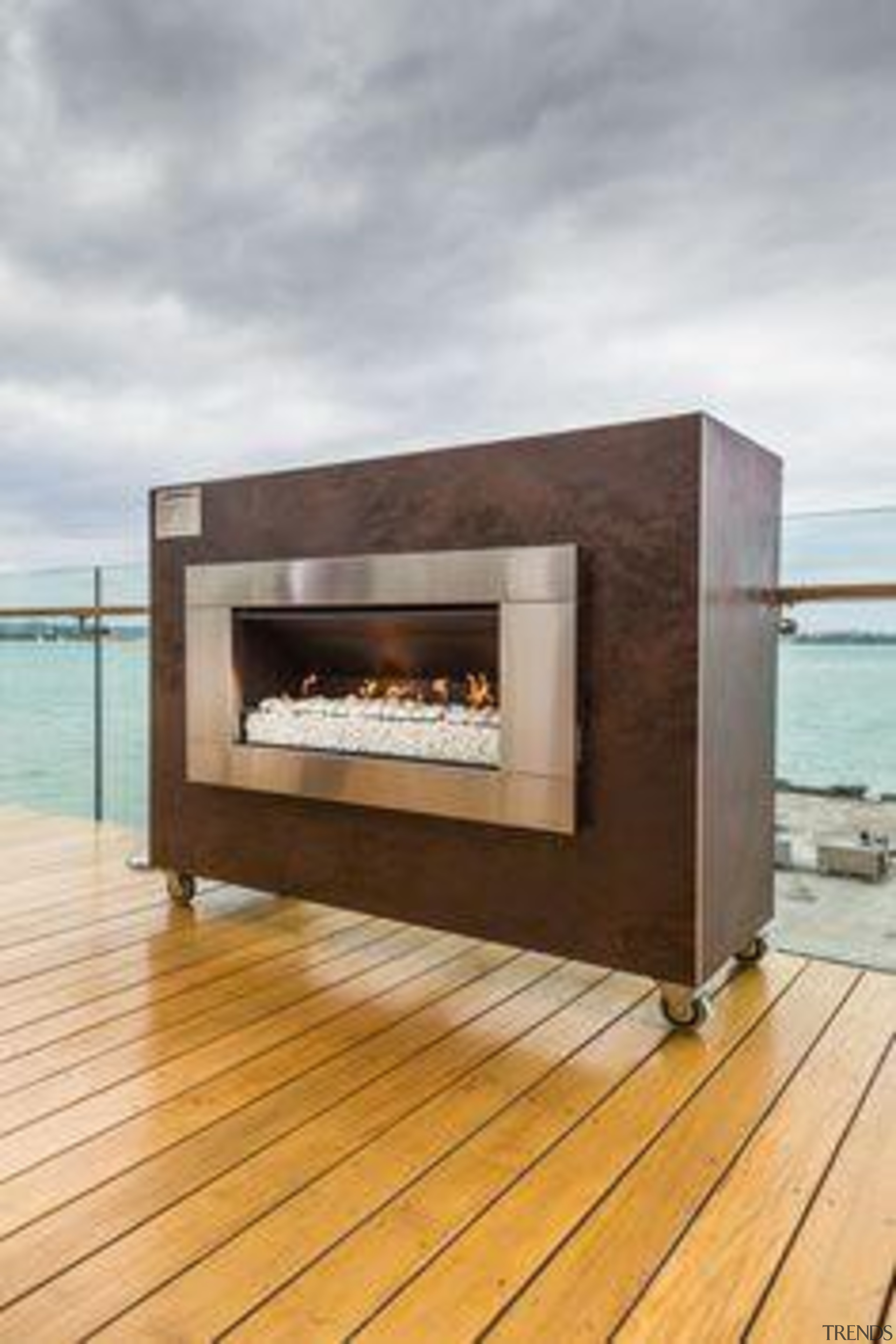 Escea fireplace, clad in Laminam Oxide Moro. - fireplace, gray, orange