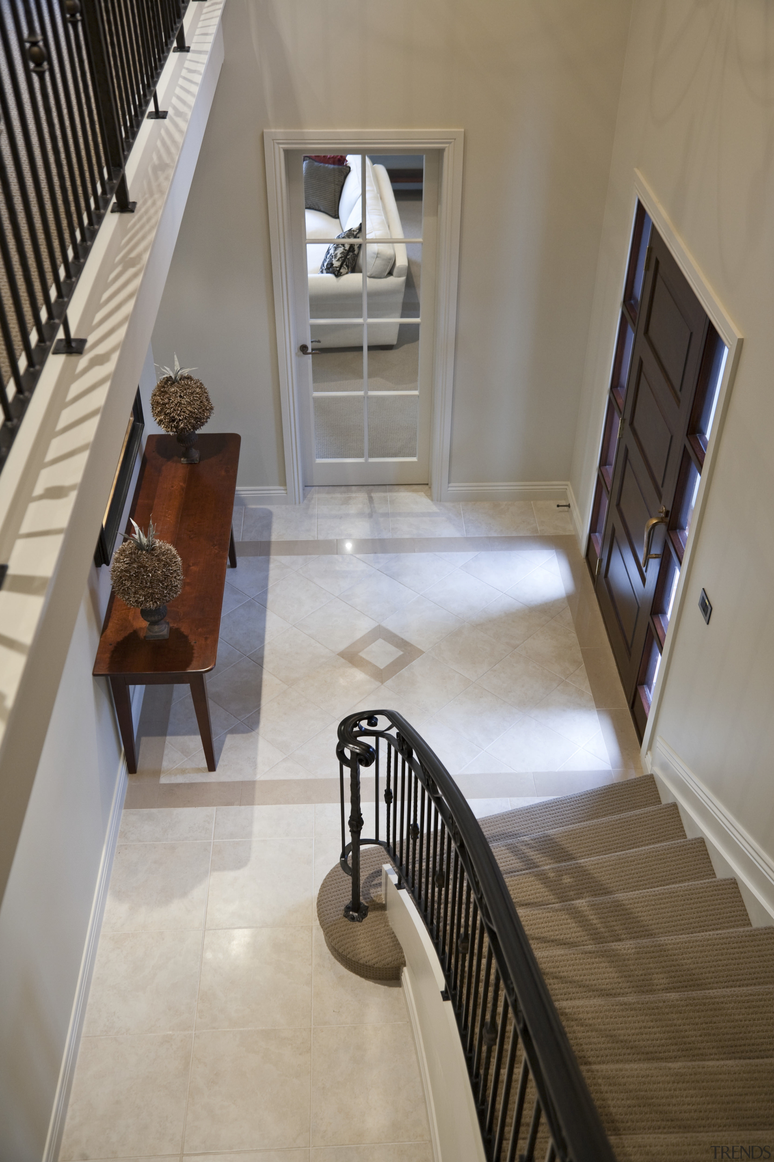 View of stairway which features iron balustrade and architecture, ceiling, estate, floor, flooring, handrail, hardwood, home, house, interior design, laminate flooring, property, room, stairs, tile, wall, window, wood, wood flooring, gray, brown