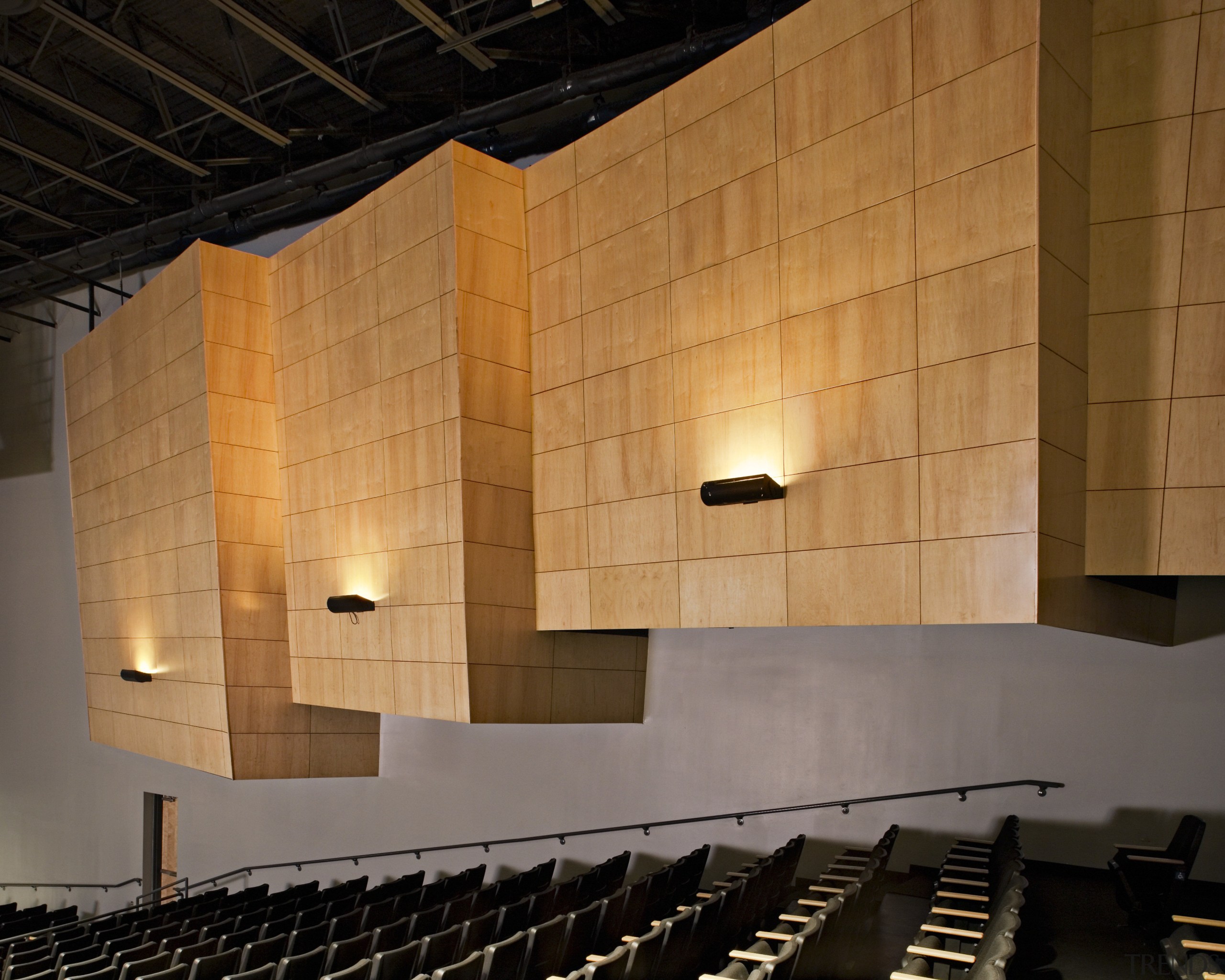 View of the auditorium which has more subdued architecture, auditorium, building, ceiling, concert hall, daylighting, interior design, light, lighting, opera house, performing arts center, theatre, wall, wood, orange