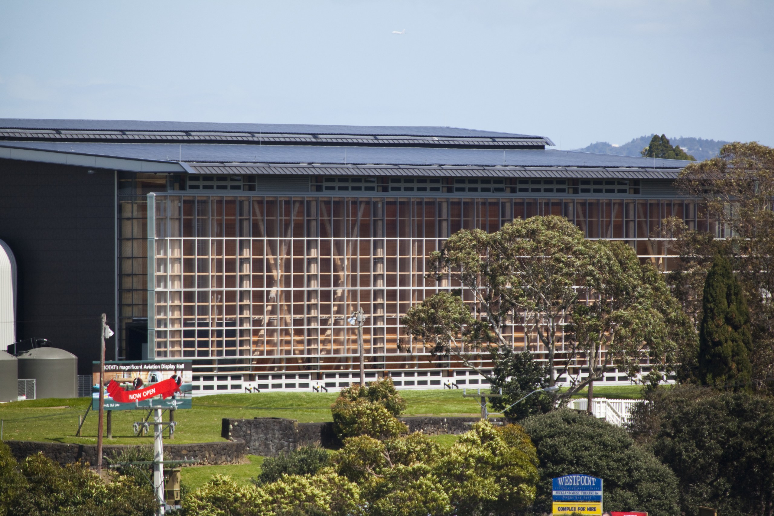 The timber for this MOTAT Aviation Display Hall architecture, building, city, corporate headquarters, facade, real estate, residential area, roof, structure, teal, black