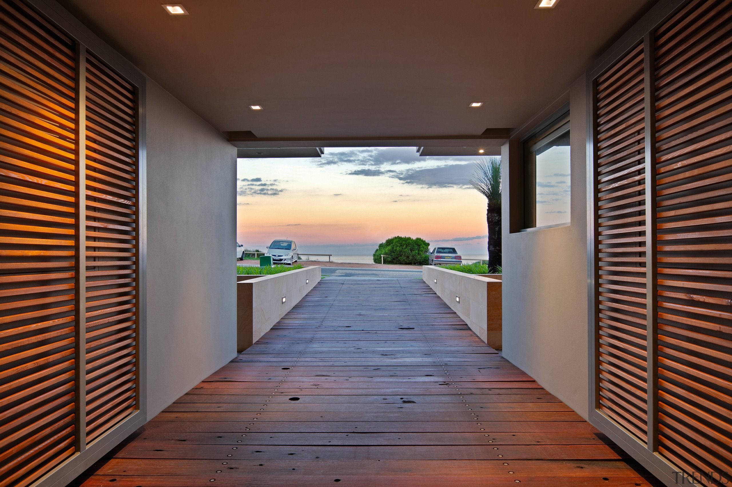 A view of the 13 metre long central apartment, architecture, daylighting, door, estate, floor, home, house, interior design, lighting, property, real estate, wall, window, wood, brown, black