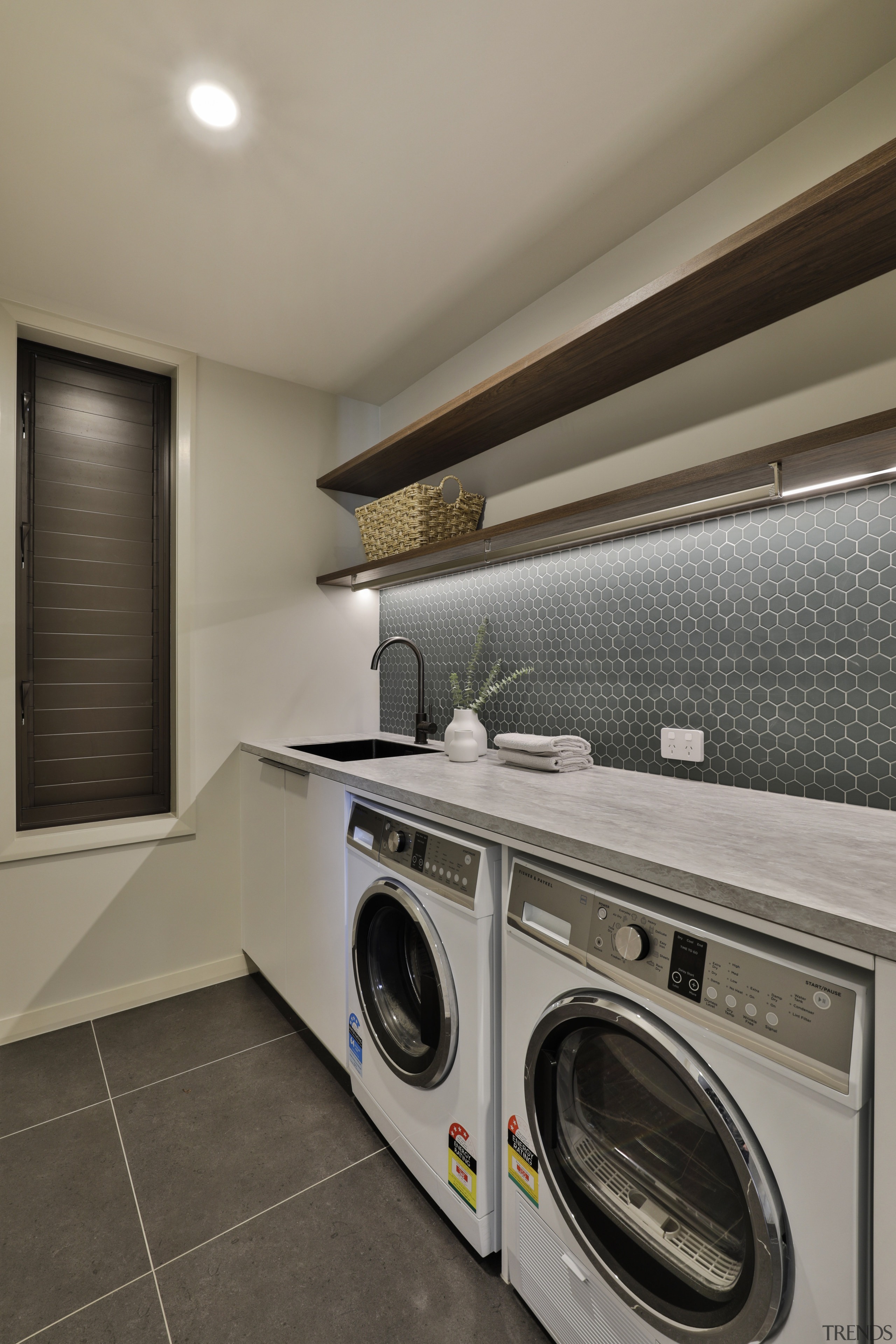 While the walls of the laundry are painted, 