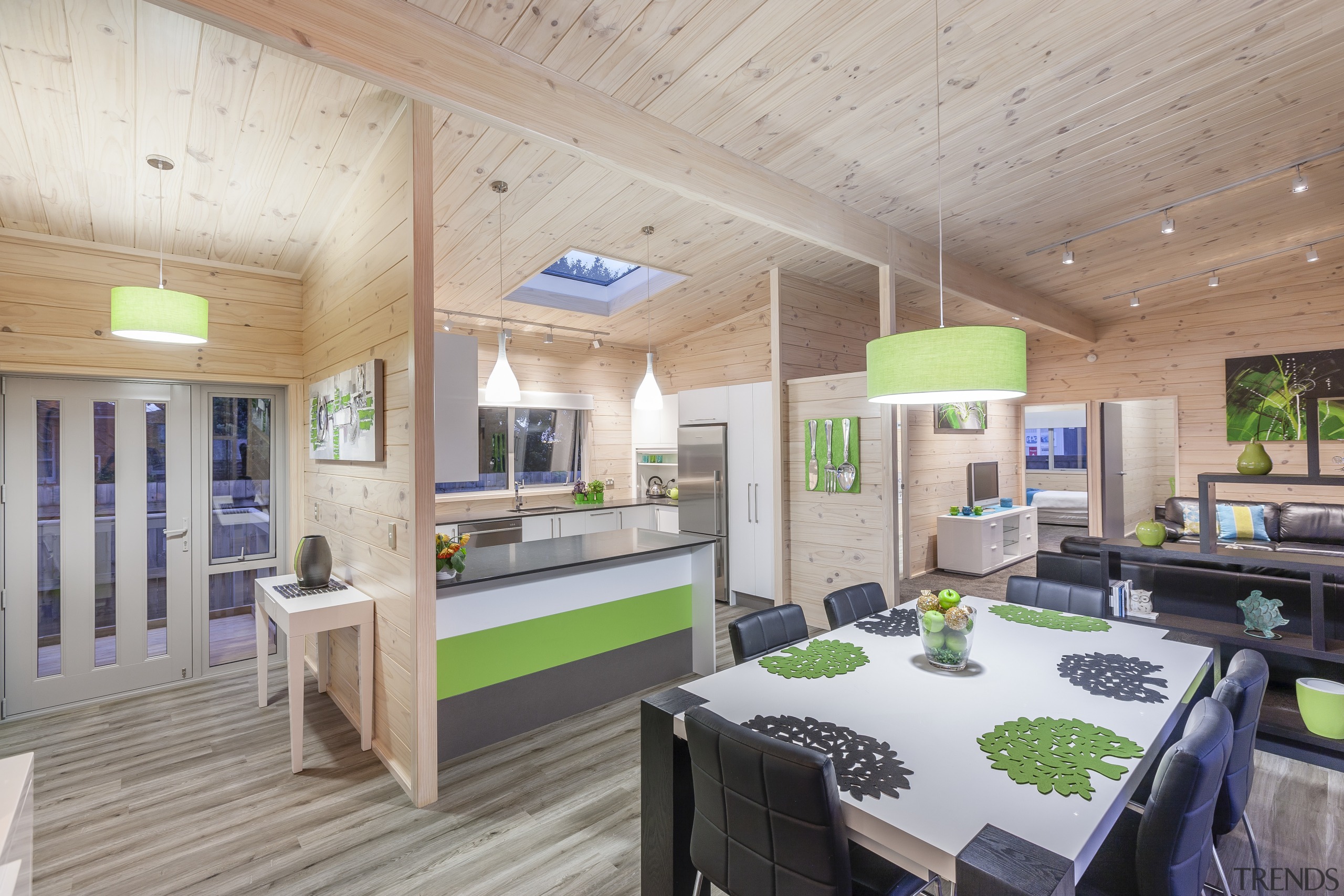 Blonded timber lines the walls and ceilings, helping interior design, real estate, gray