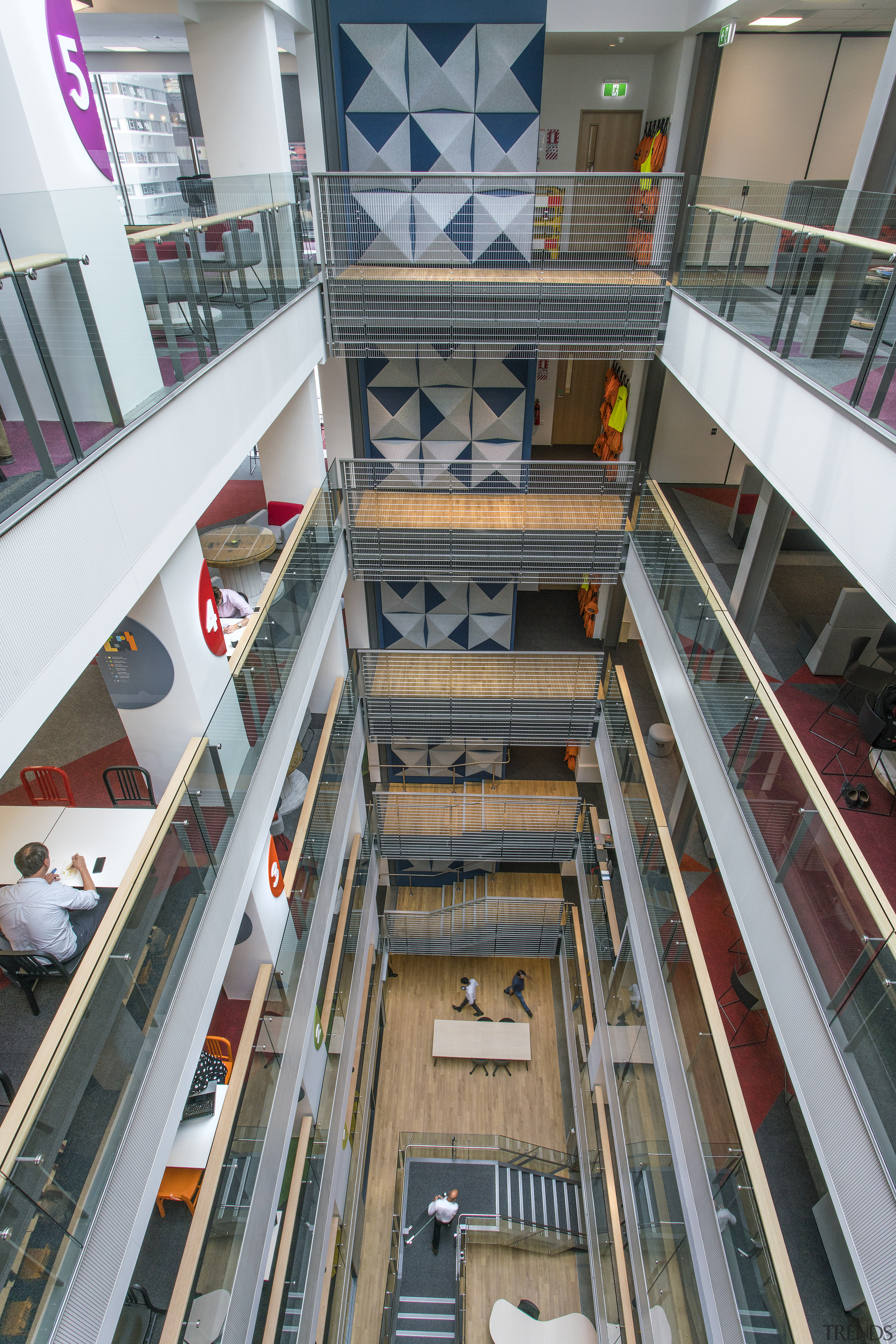 Tower of power – colourful signage, carpets and architecture, building, metropolitan area, shopping mall, gray