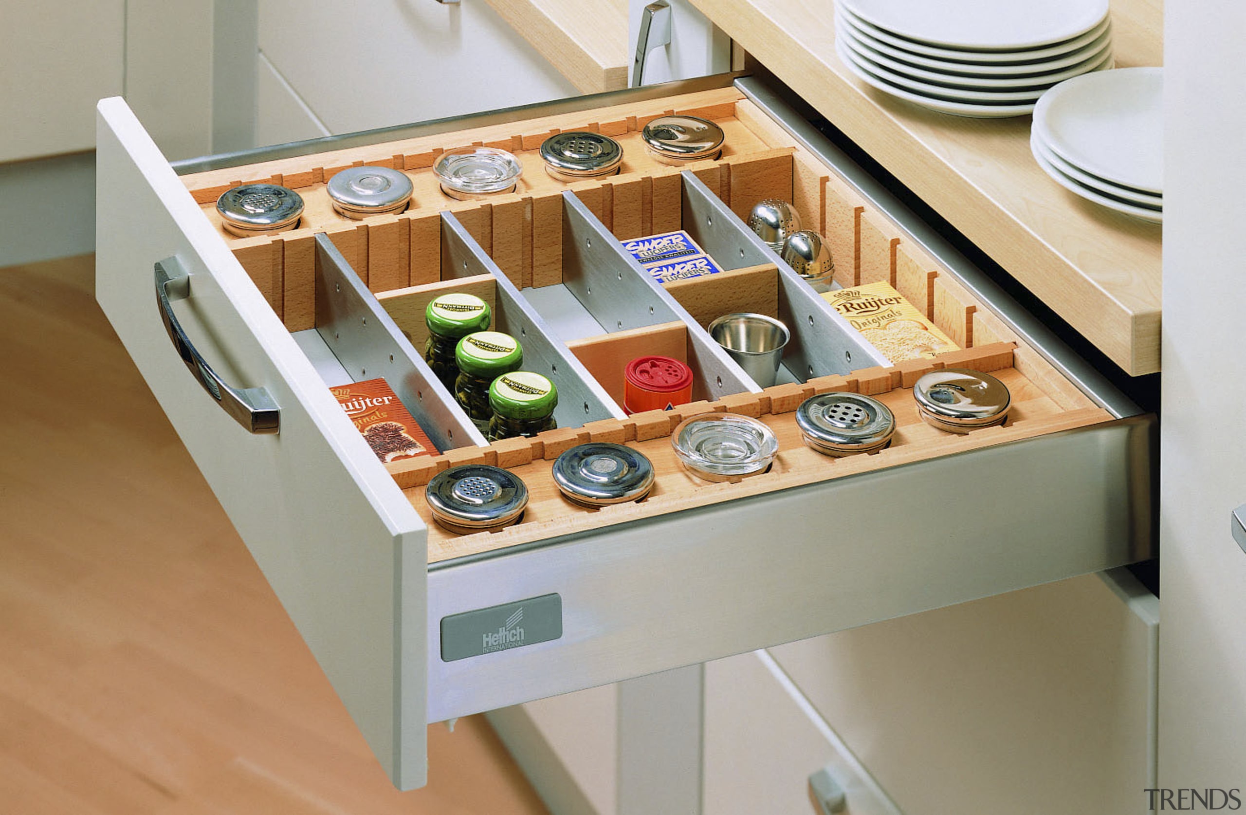 View of kitchen cabinetry with Hettich hardware and drawer, furniture, kitchen organizer, product design, shelf, shelving, table, gray