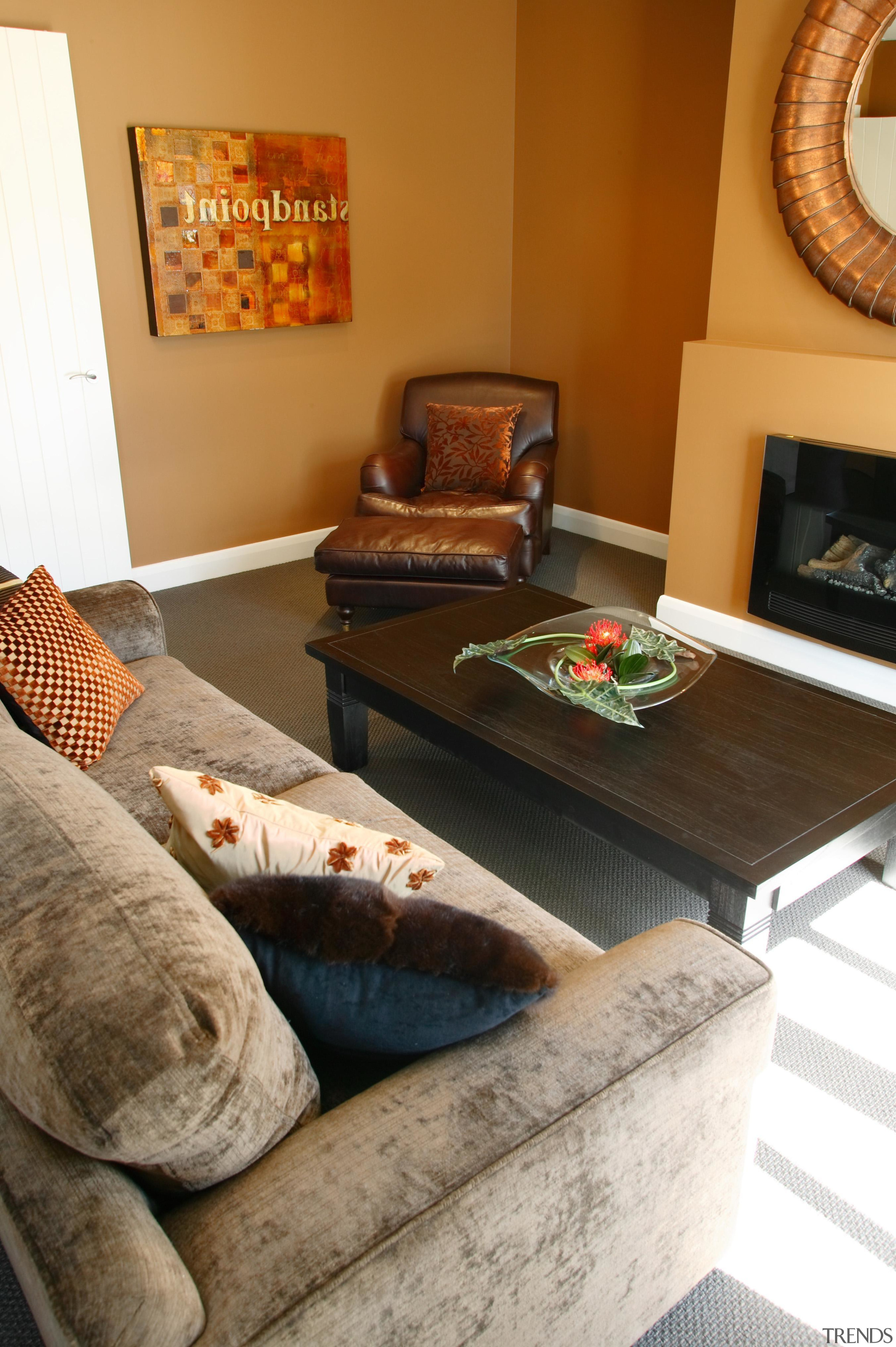 Orange family lounge in Temuka - Landmark Temuka floor, flooring, furniture, home, interior design, living room, room, table, brown