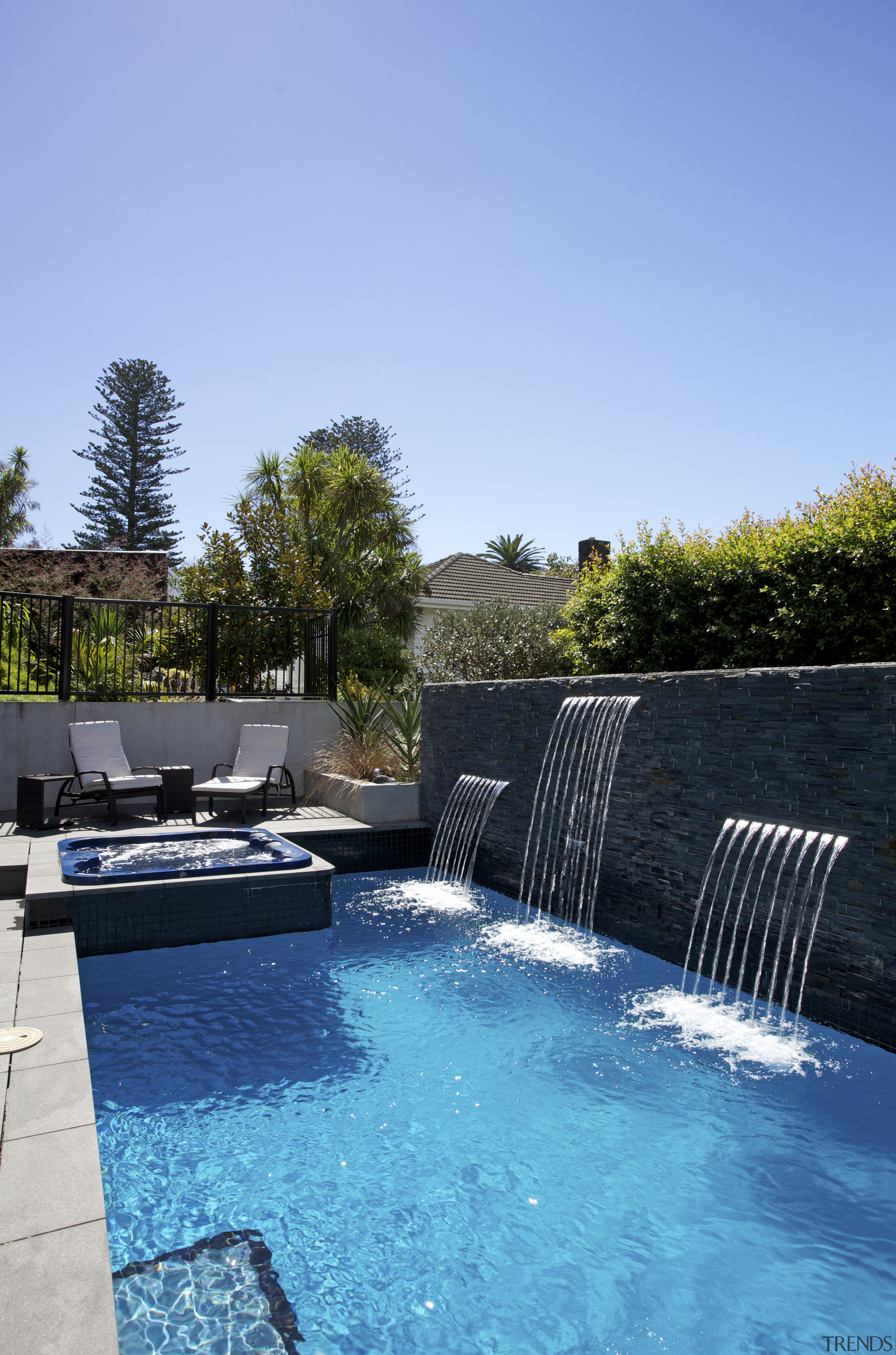 Renovated Omana Lodge by Constable Hurst Architects backyard, estate, home, house, leisure, plant, property, real estate, reflection, resort, sky, swimming pool, tree, vacation, water, water feature, teal