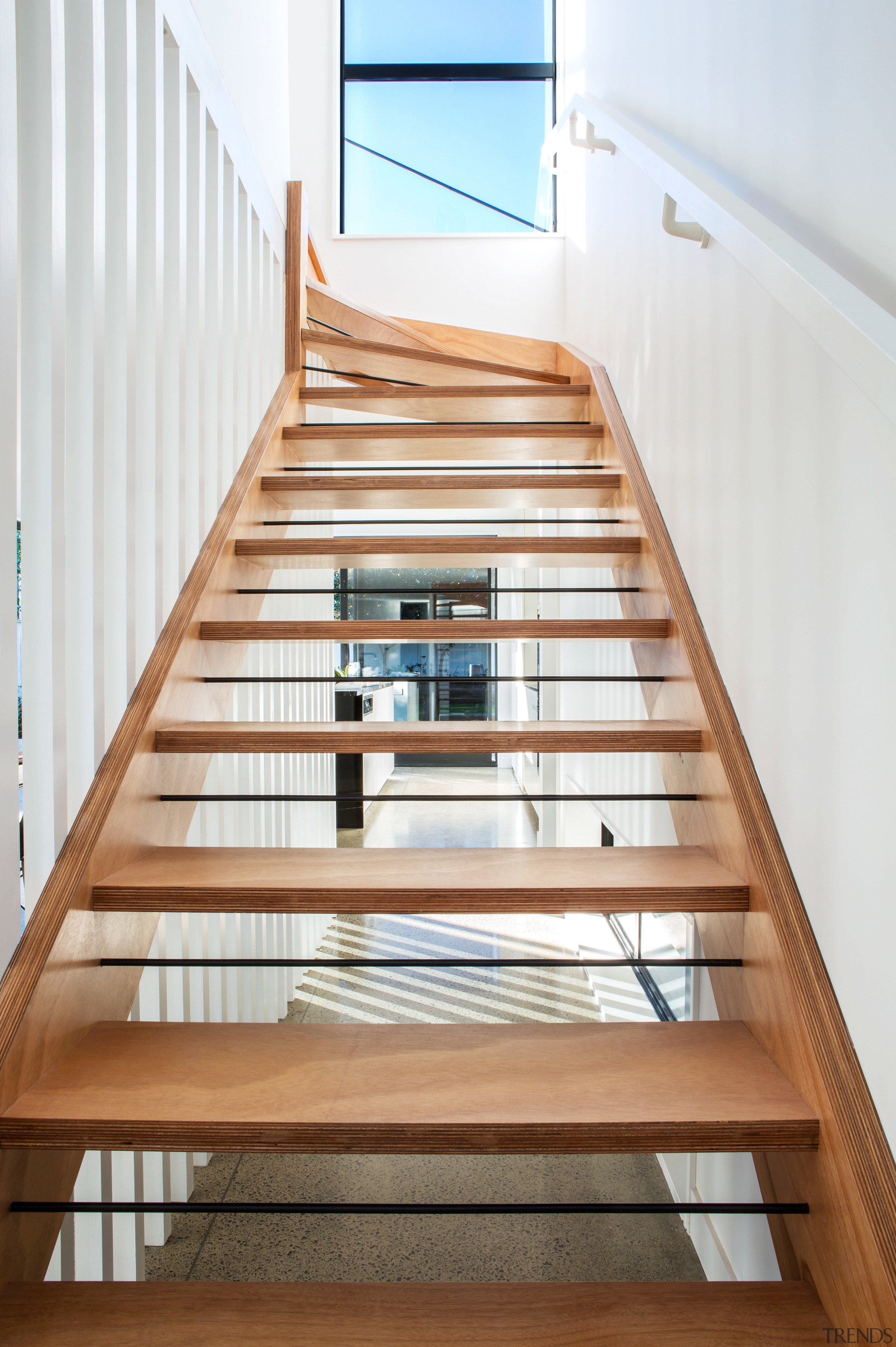 Wire inserts between the open treads on this apartment, architecture, daylighting, floor, glass, handrail, stairs, wood, white