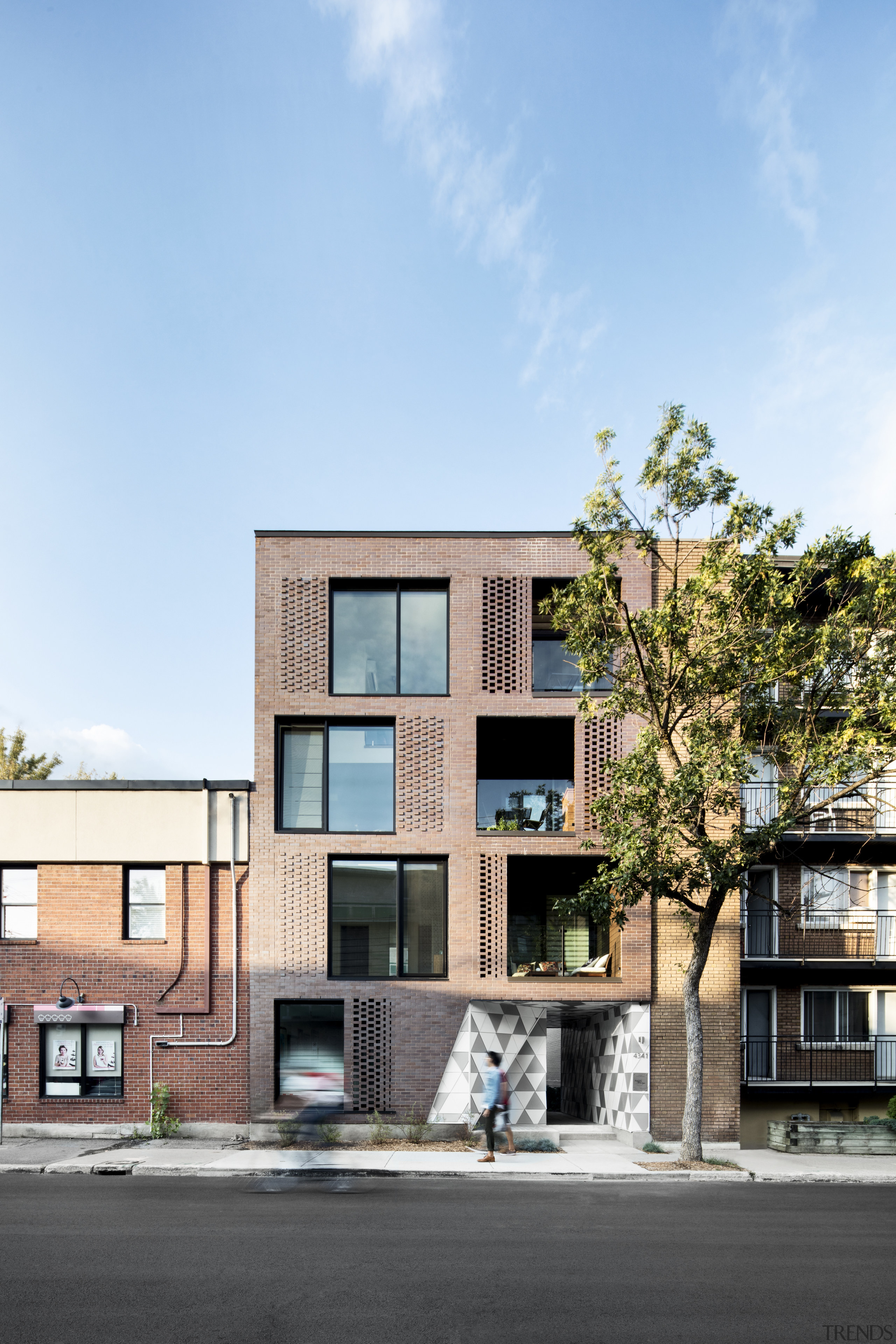 The predominant brick cladding on La Géode apartment apartment, architecture, building, condominium, elevation, facade, home, house, mixed use, neighbourhood, real estate, residential area, sky, suburb, teal