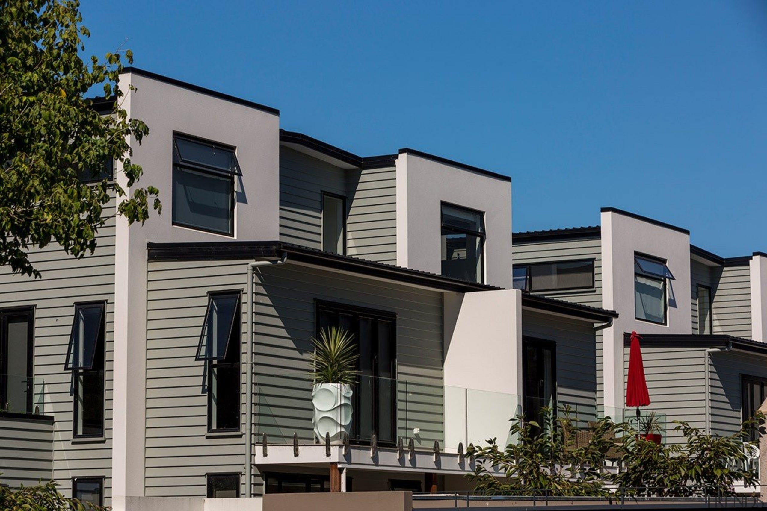 The new and innovative Envira Weatherboard System, with apartment, architecture, building, condominium, elevation, facade, home, house, mixed use, neighbourhood, property, real estate, residential area, siding, window, gray, black, teal