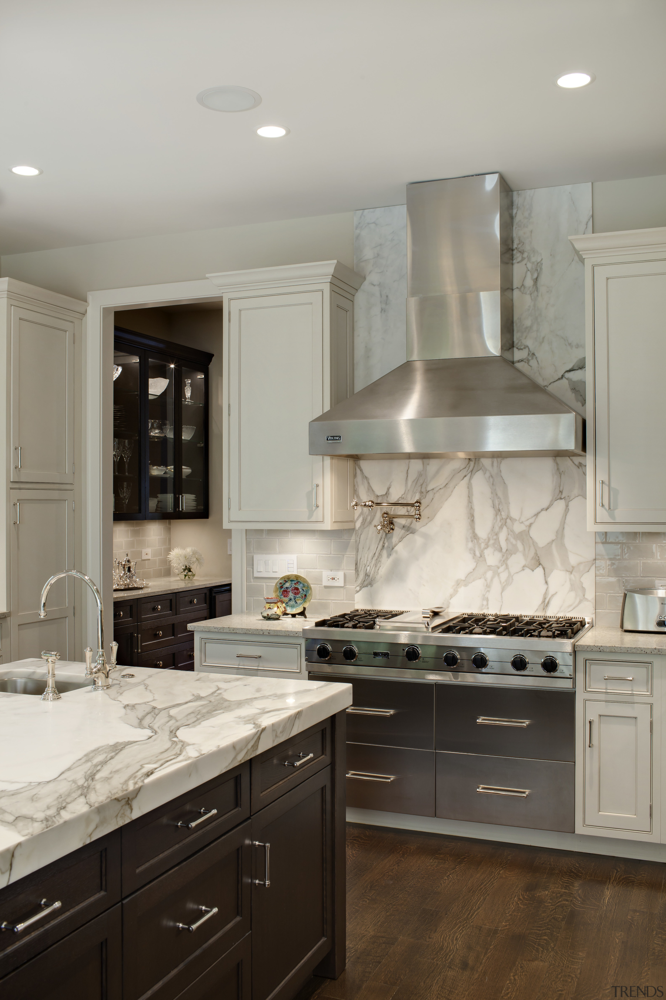 View of kitchen with wooden flooring, stainless drawers cabinetry, countertop, cuisine classique, floor, flooring, hardwood, home, home appliance, interior design, kitchen, kitchen appliance, room, tile, wood flooring, gray