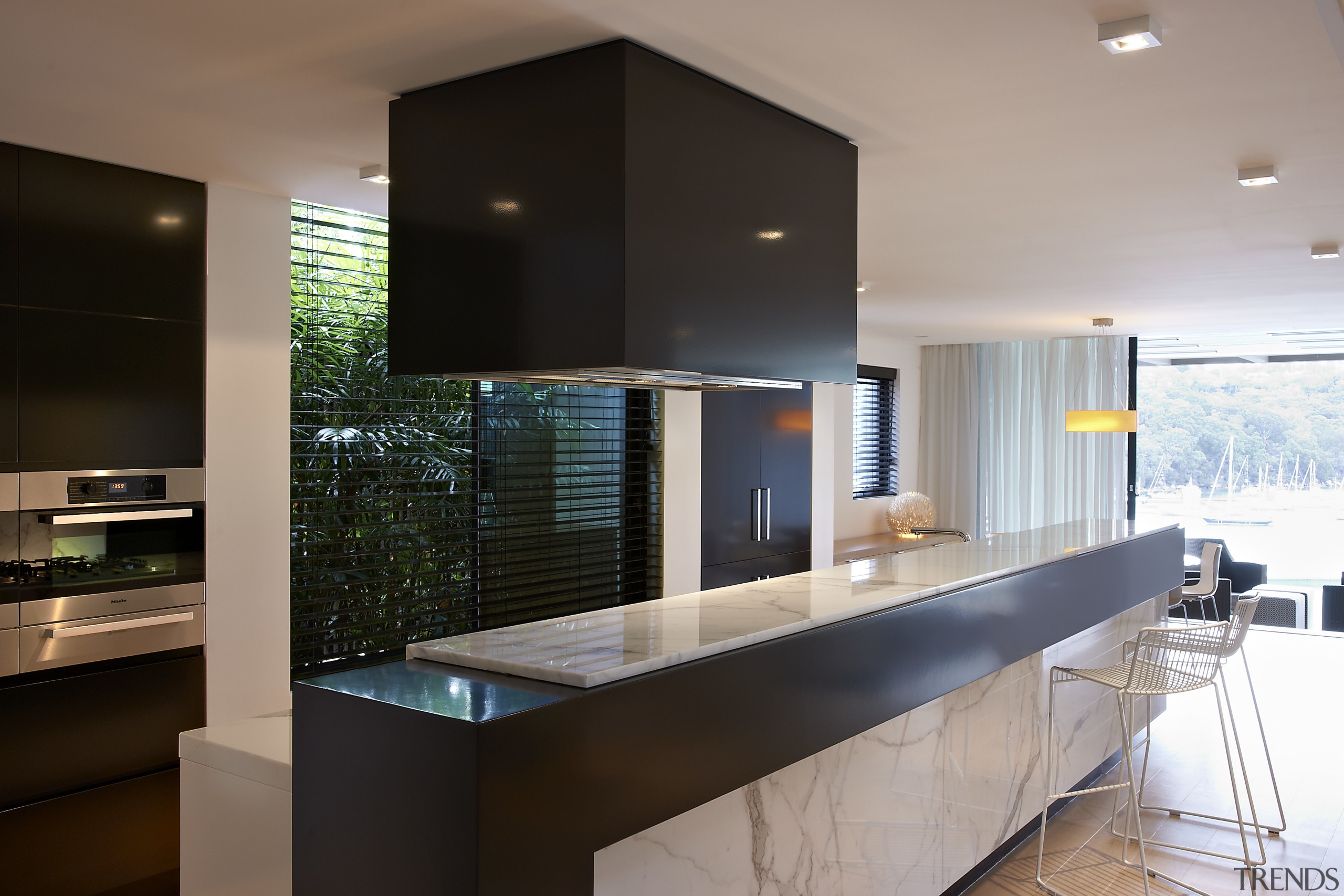 The kitchen designed by Michael Kilkeary features ventilation architecture, cabinetry, countertop, interior design, kitchen, real estate, black, gray