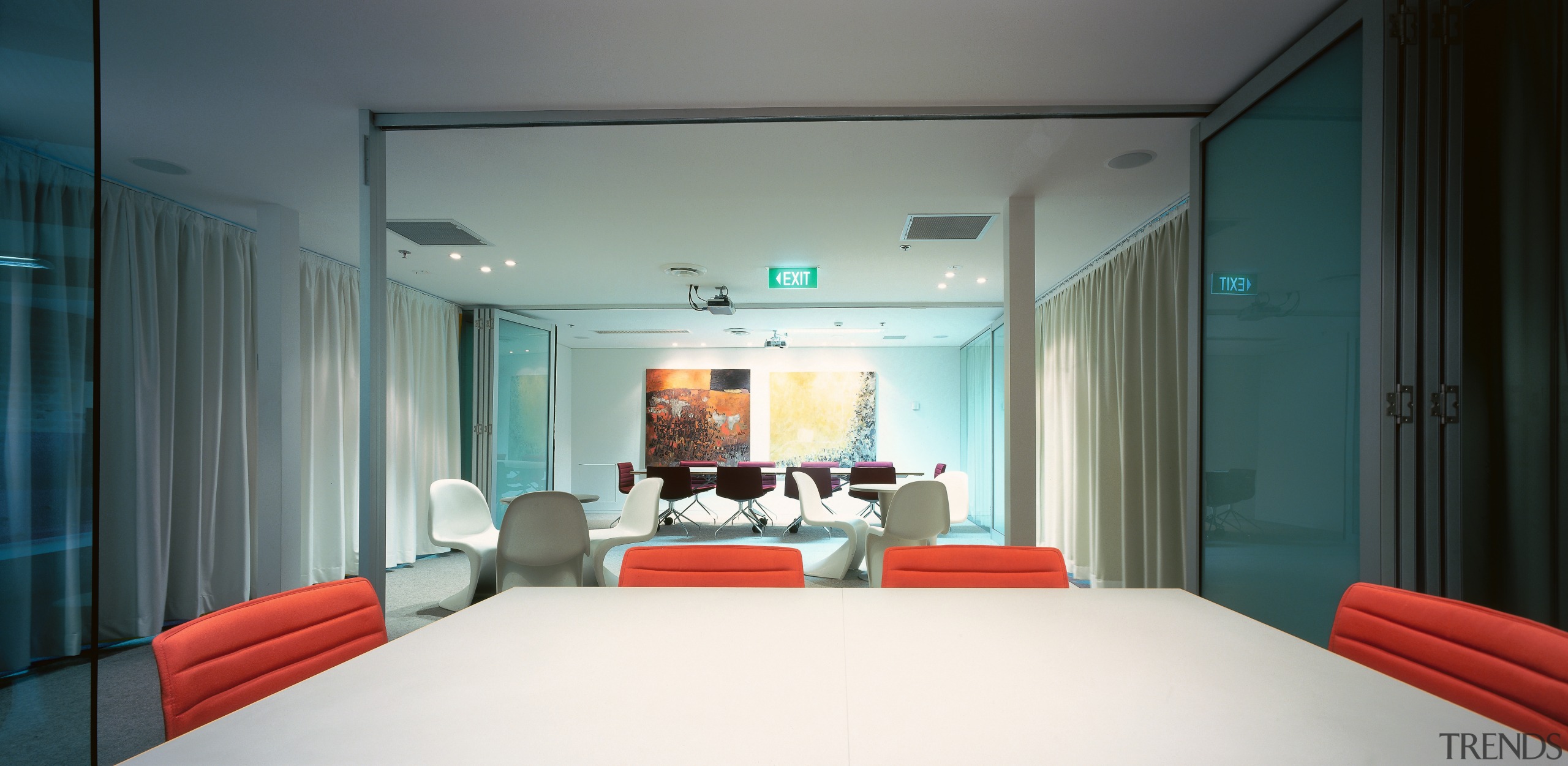 A view of the boradroom, lagre wooden desks, architecture, ceiling, interior design, room, gray, black