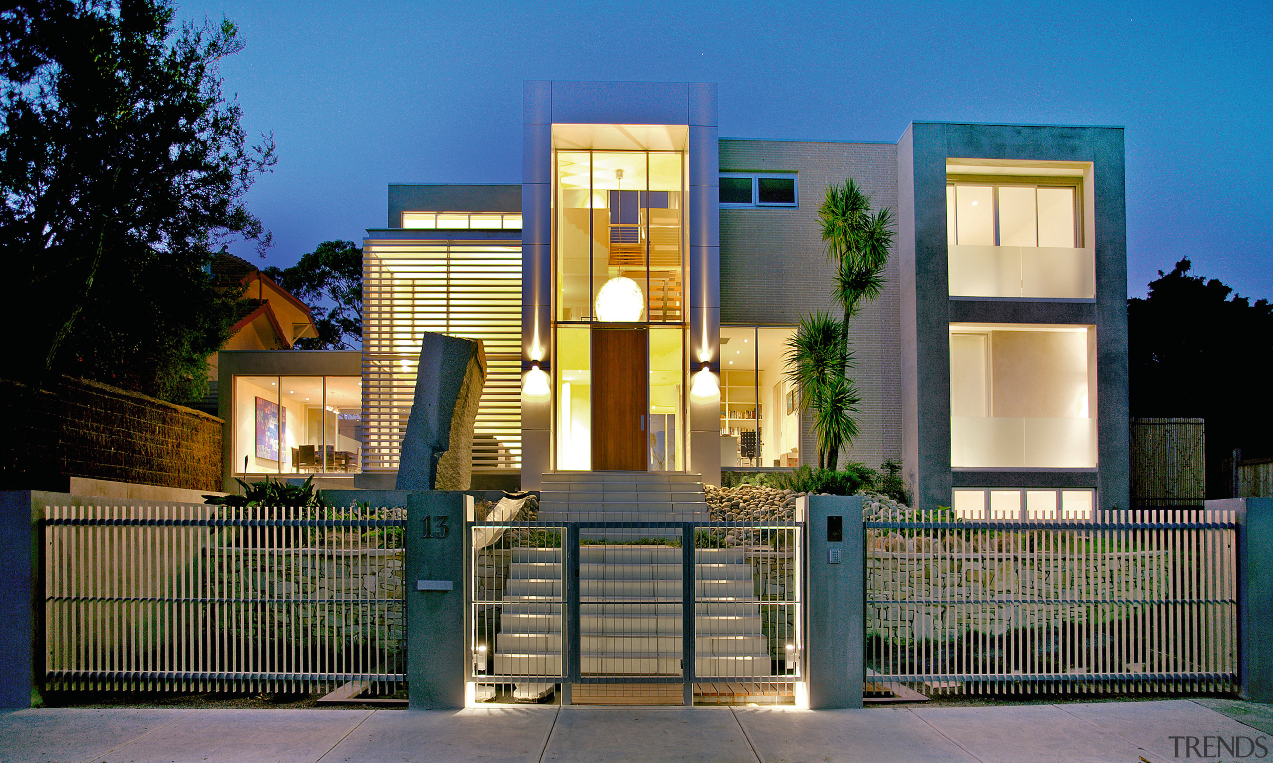 An exterior view of this contemporary family home building, elevation, estate, facade, gate, home, house, property, real estate, residential area