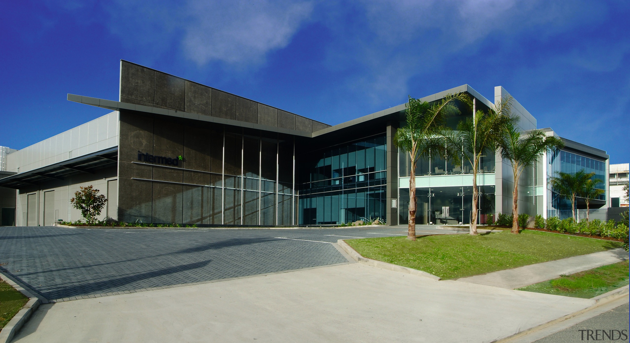 Exterior view of commercial office and warehouse building architecture, building, commercial building, corporate headquarters, daytime, estate, facade, headquarters, home, house, mixed use, real estate, sky, window, gray, blue