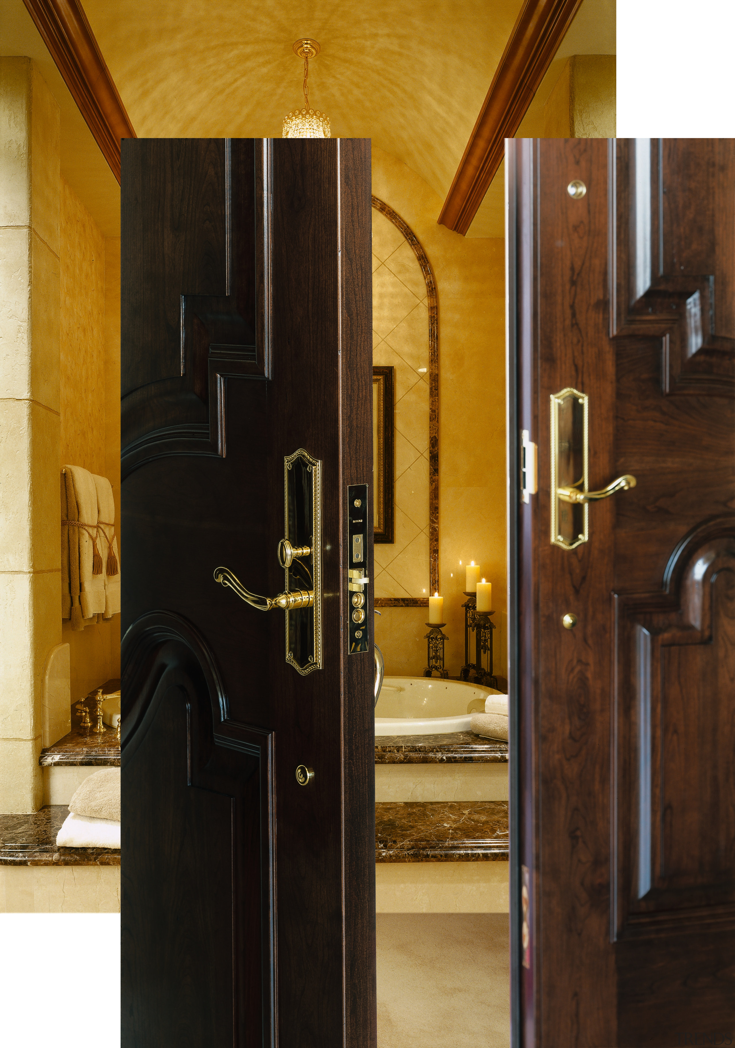 A view of two wooden doors with gold door, interior design, wood, black