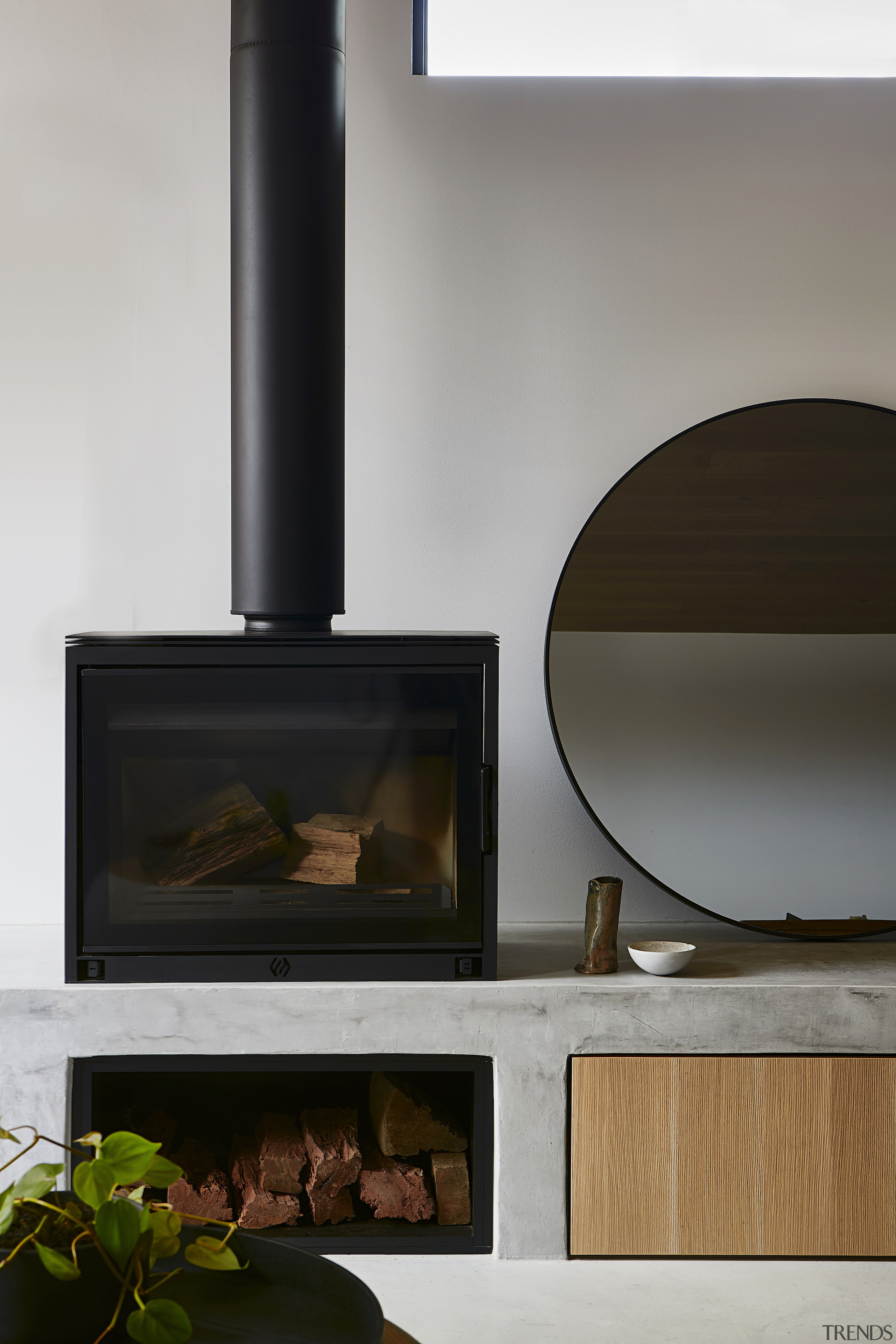 A contemporary wood burner is part of the 