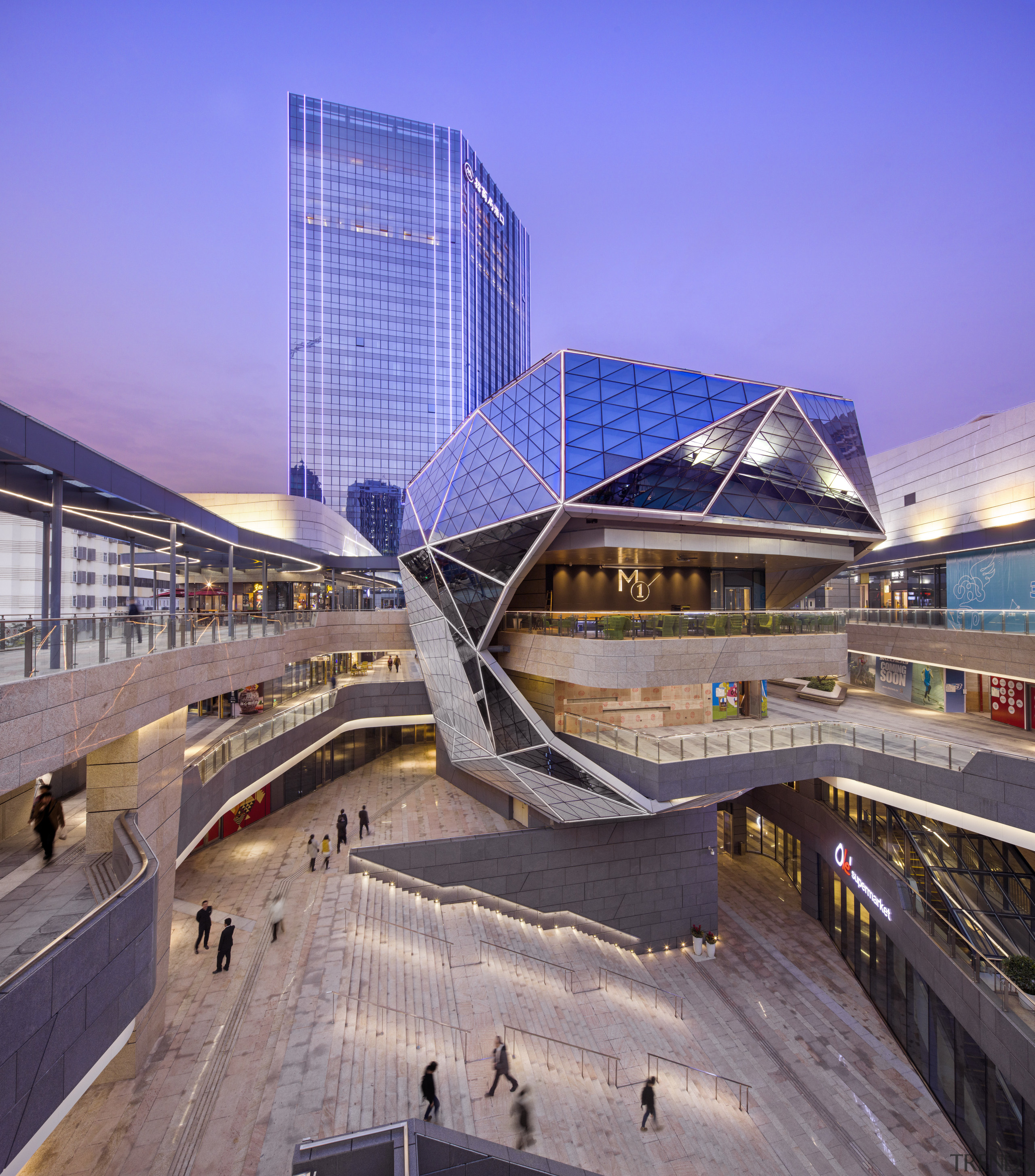 The distinctive architecture of the central pavilion at architecture, building, city, cityscape, corporate headquarters, daytime, downtown, headquarters, landmark, metropolis, metropolitan area, mixed use, sky, skyscraper, skyway, structure, tower block, urban area, blue, gray