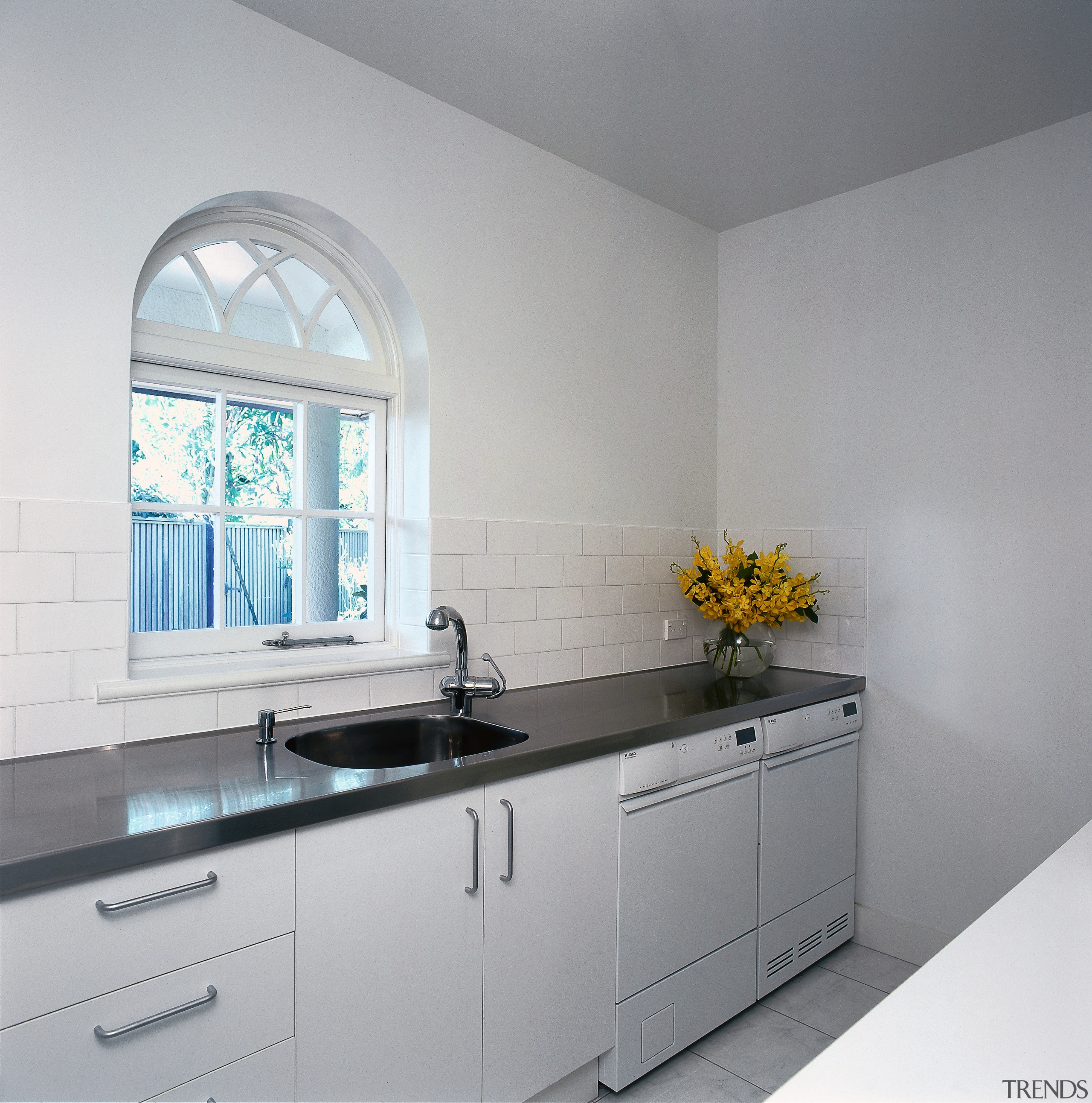 vioew of this laundry  designed by sandra countertop, interior design, kitchen, property, room, gray