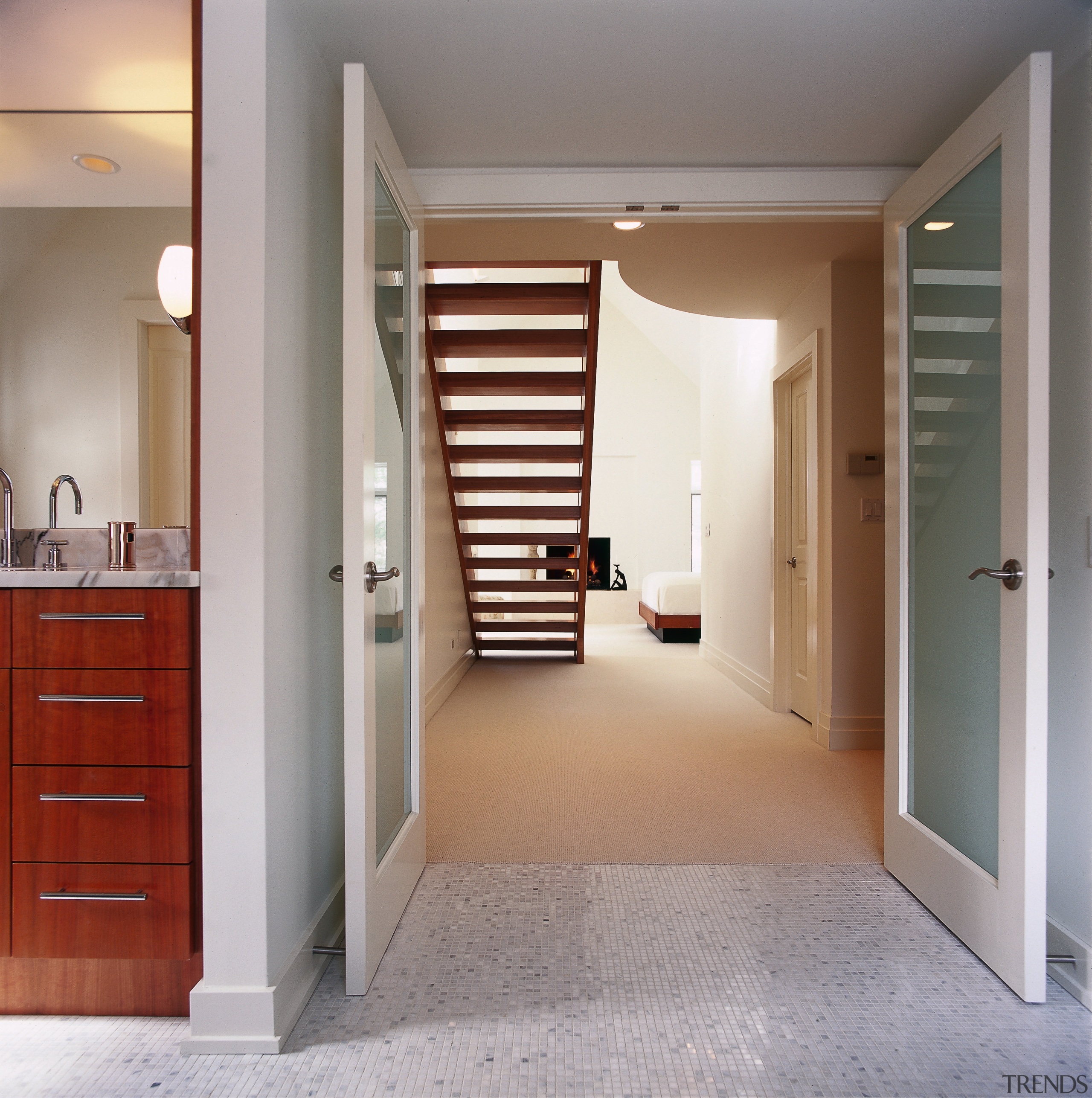 Open stairs allow an uninterrupted view between bedroom door, floor, flooring, hardwood, home, interior design, real estate, room, wall, window, wood, wood flooring, gray