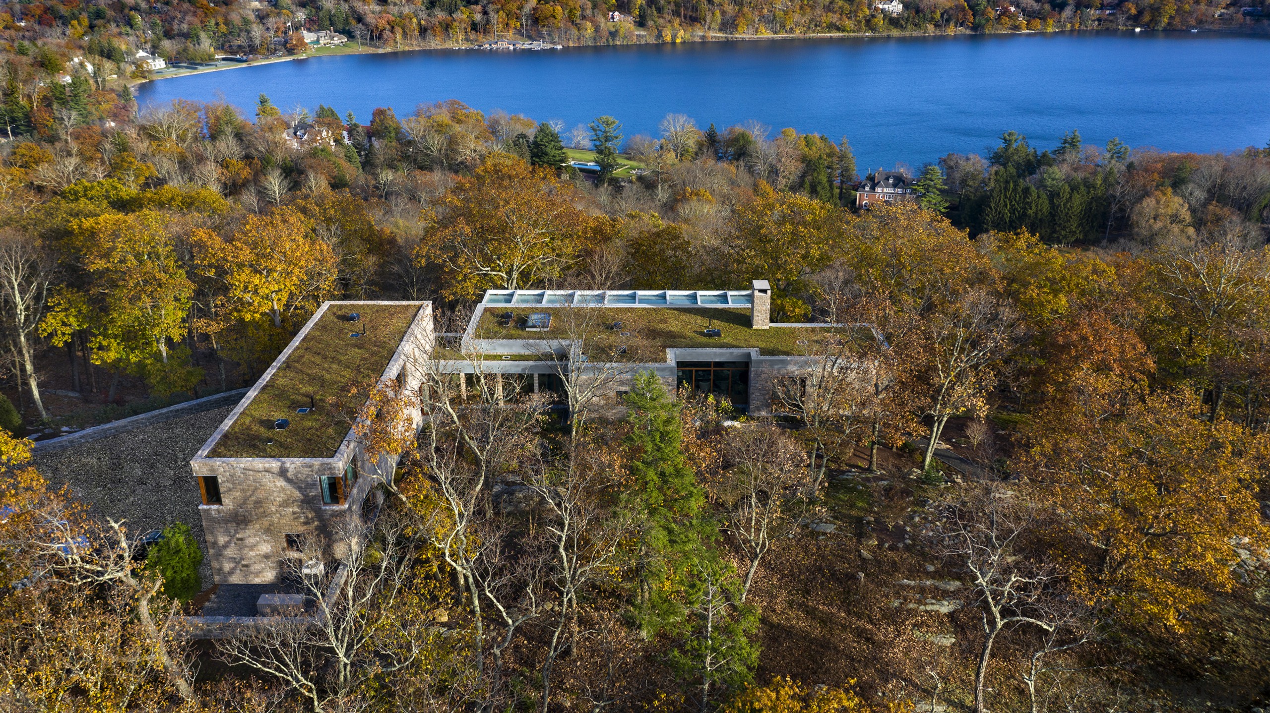 The home follows an L-shaped plan that wraps 