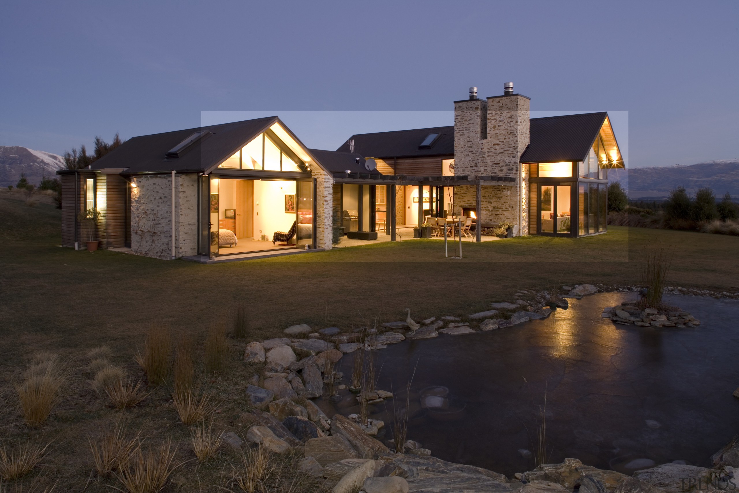 Open to the elements - architect Ken Warburton's cottage, estate, evening, facade, farmhouse, home, house, landscape, lighting, property, real estate, reflection, residential area, roof, siding, sky, black, blue