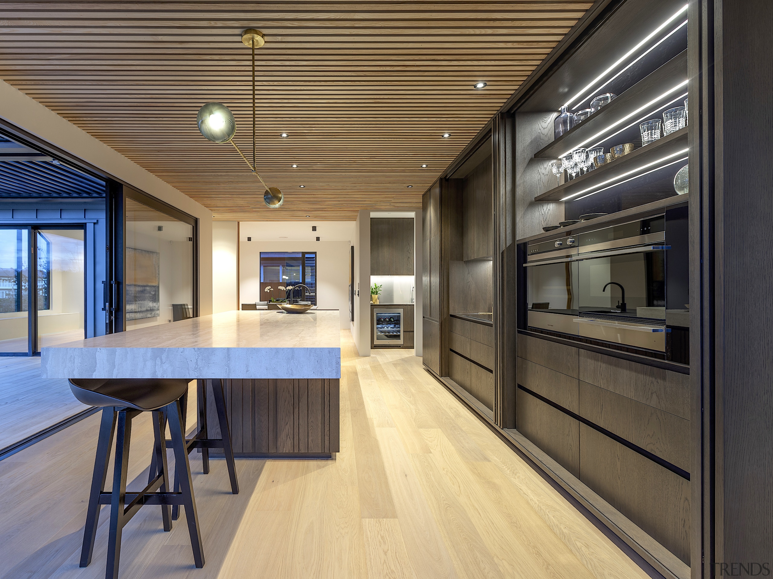 Vertical timber panelling to the island is matched architecture, building, cabinetry, ceiling, countertop, design, floor, flooring, furniture, hall, hardwood, home, house, interior design, kitchen, lighting, loft, office, plywood, property, real estate, room, table, wall, wood, wood flooring, yellow, black