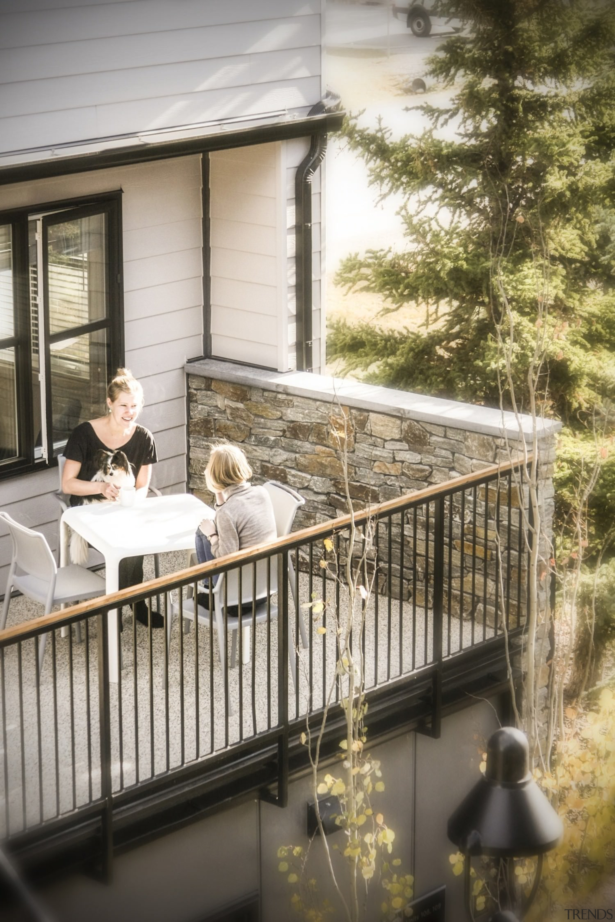 These terraces face out to the courtyard area balcony, furniture, home, house, outdoor structure, window, white