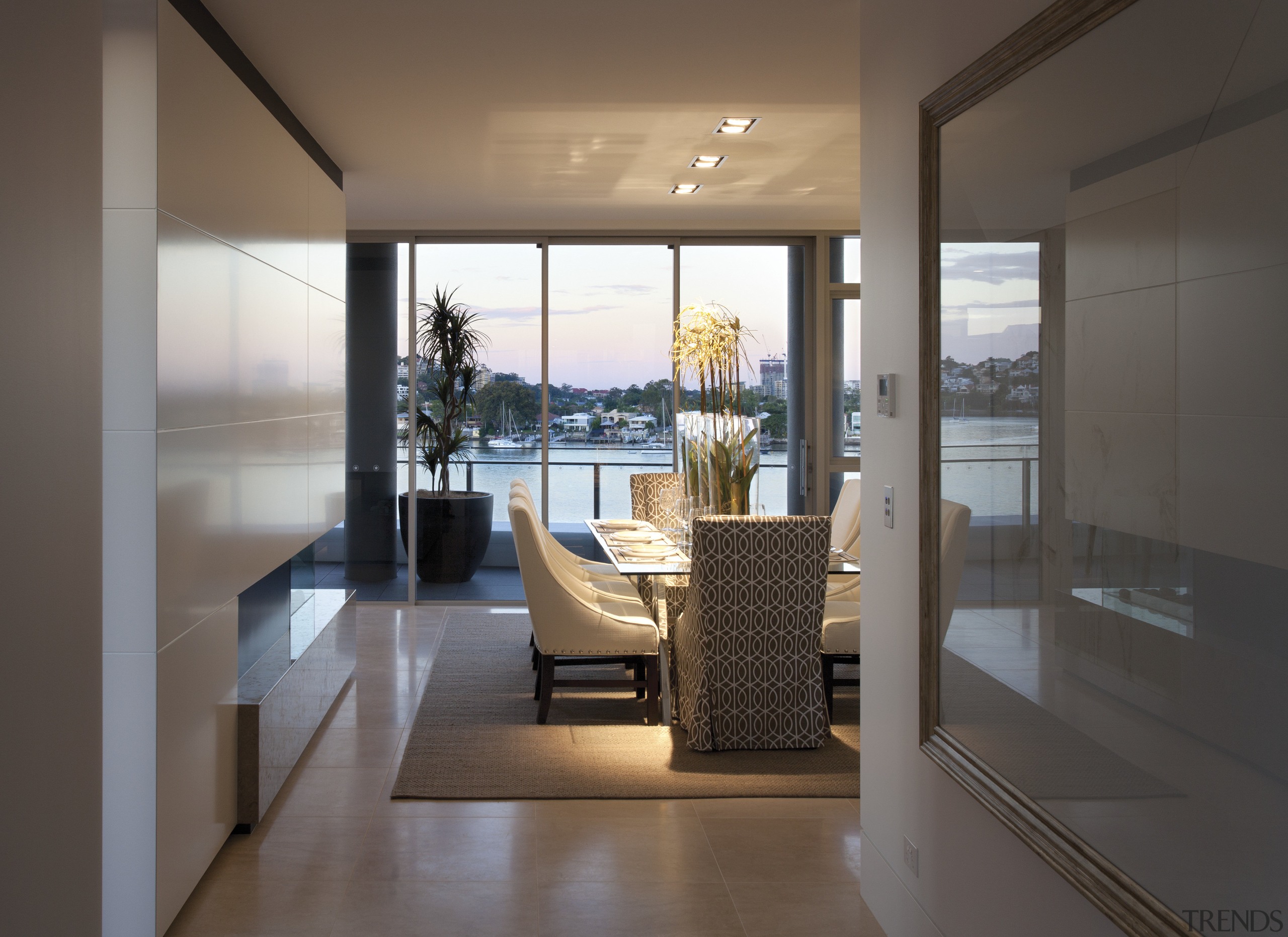 View to dining area with light toned chairs. apartment, architecture, ceiling, floor, house, interior design, living room, penthouse apartment, real estate, window, gray, black