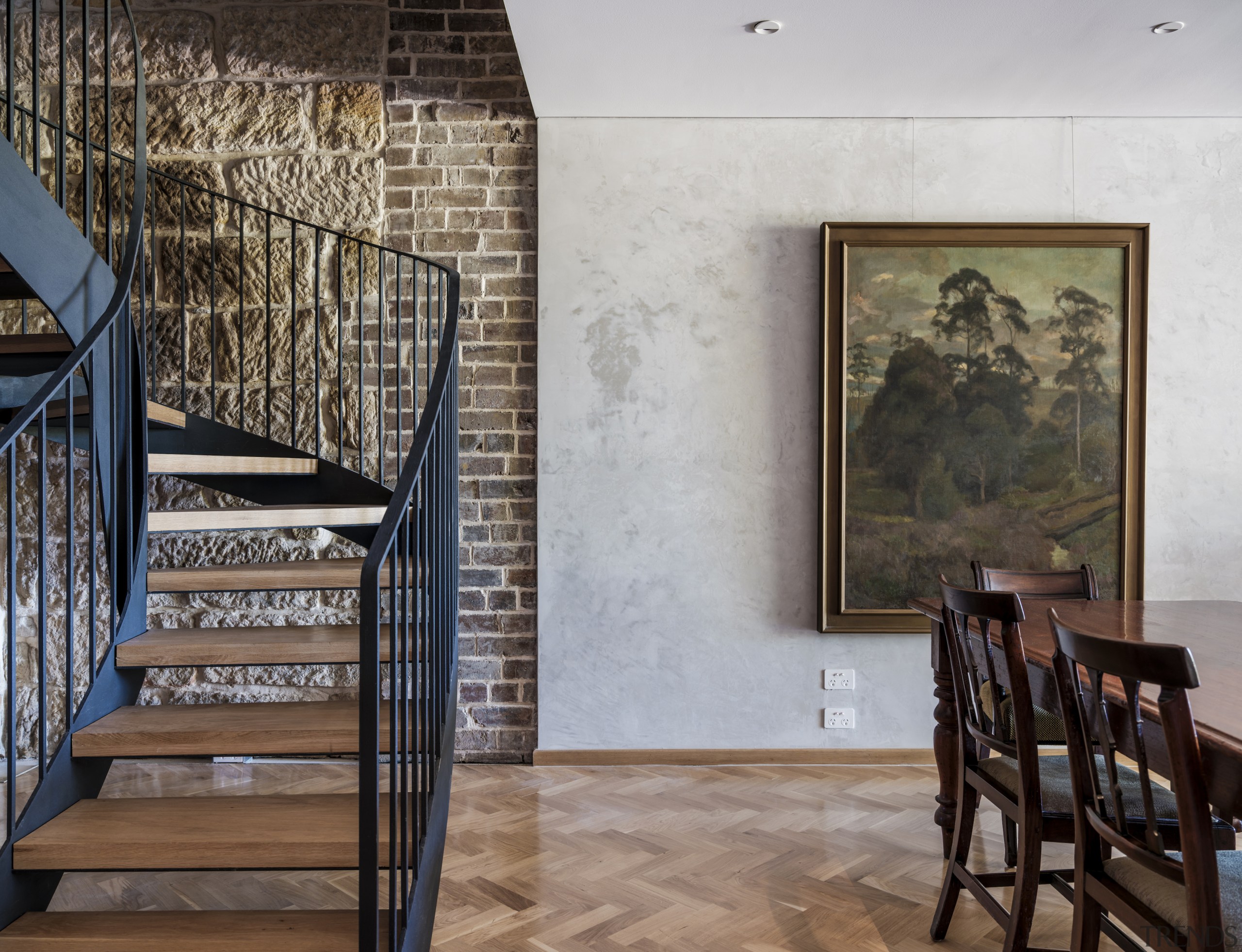 Layers of texture are complemented by plaster wall 