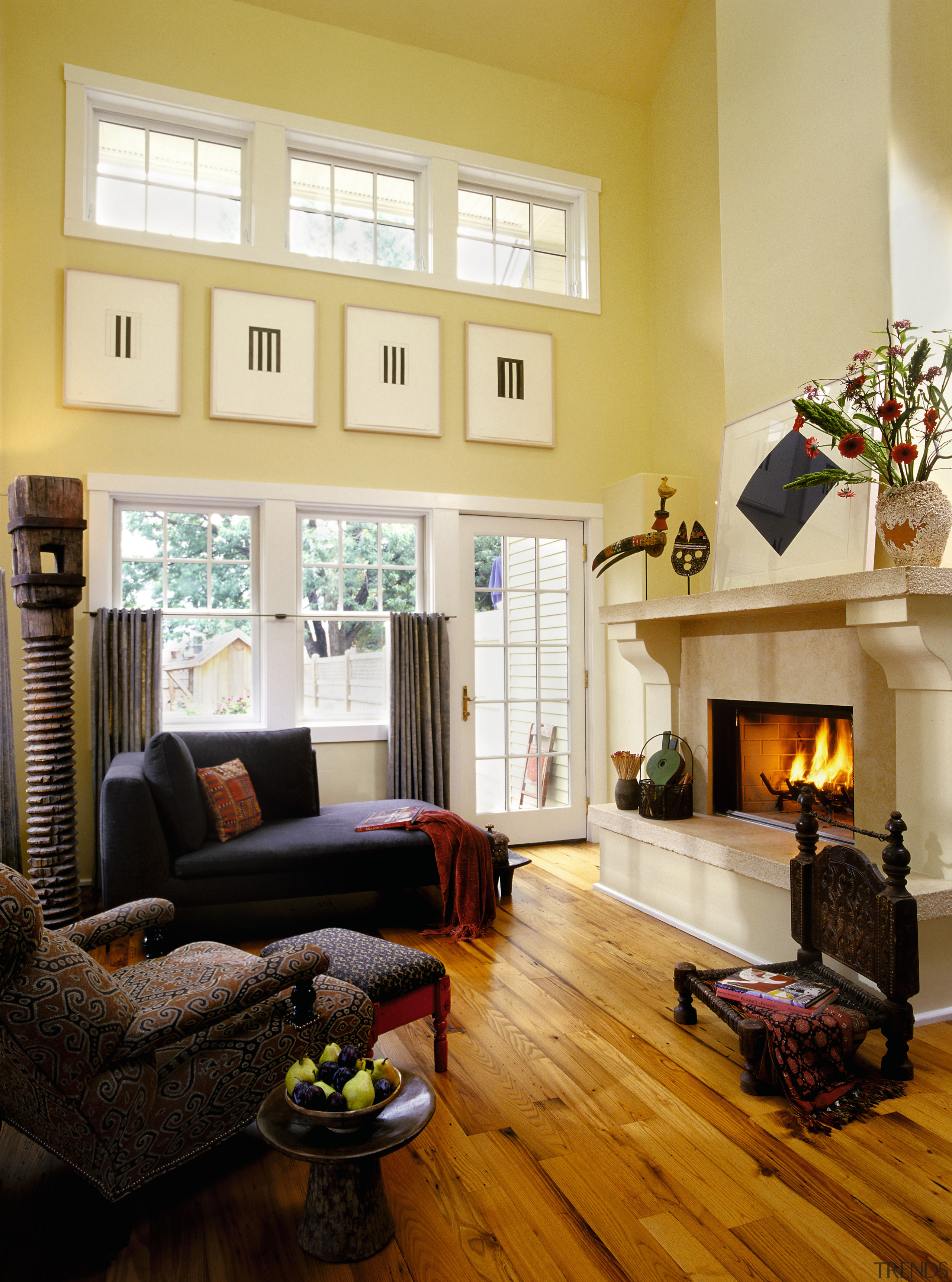 A view of some lumber by Longleaf Lumber. ceiling, couch, daylighting, fireplace, floor, flooring, hardwood, hearth, home, house, interior design, living room, real estate, room, window, window covering, window treatment, wood, wood flooring, orange