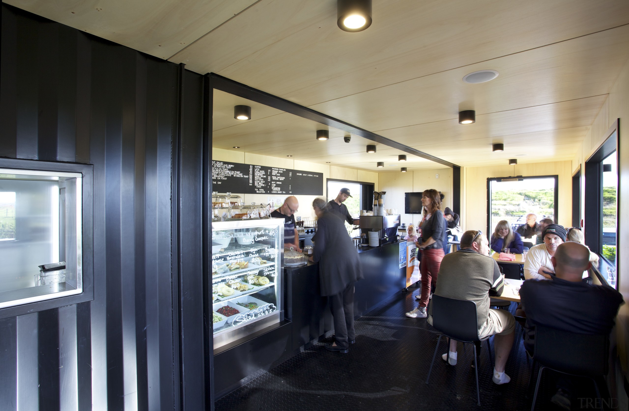 Four containers were linked to create this innovative restaurant, black