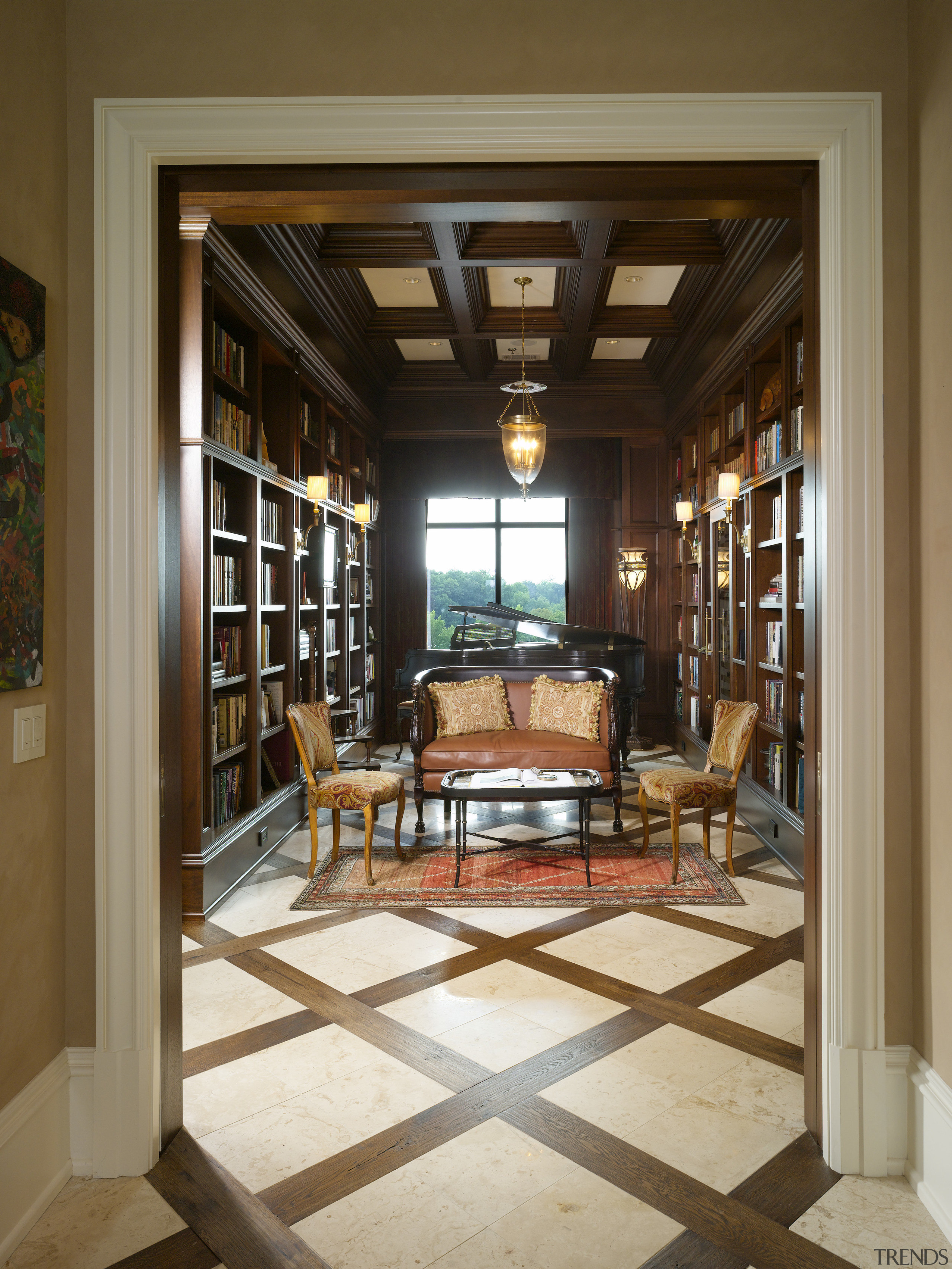 View of the library featuring coffered ceiling panels door, estate, floor, flooring, furniture, hardwood, interior design, living room, lobby, window, wood, brown