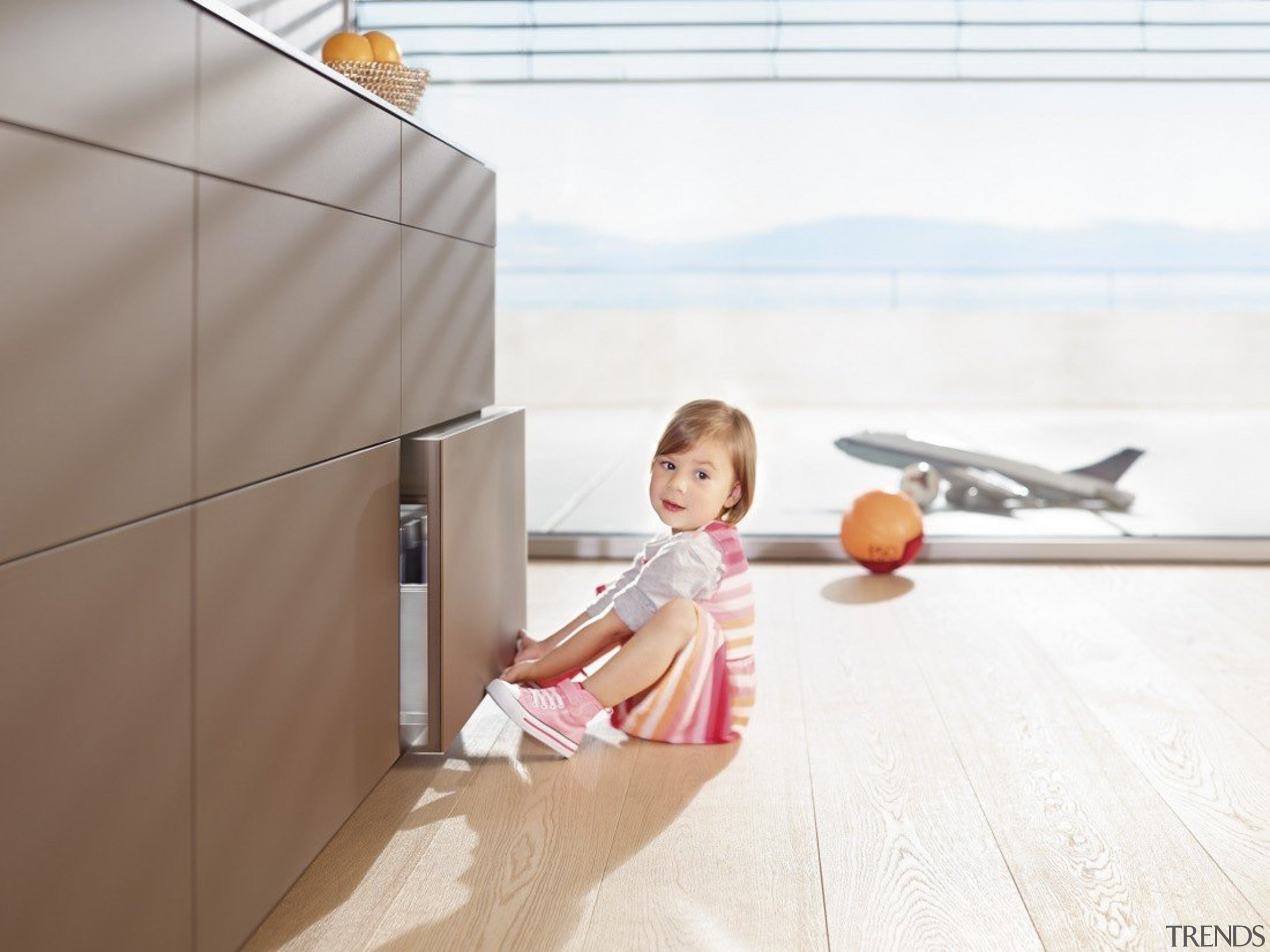 TIP-ON BLUMOTION for LEGRABOX - child | floor child, floor, flooring, furniture, product design, sitting, table, wood, white