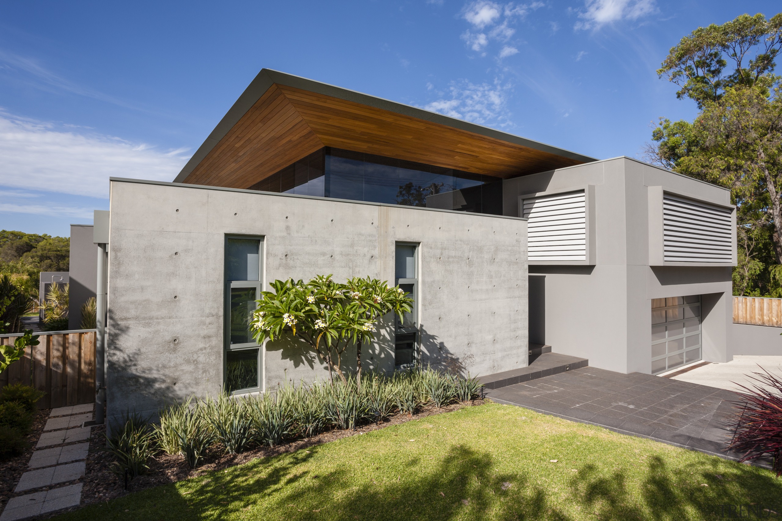 The shallow pitch of the roof and its architecture, cottage, elevation, estate, facade, home, house, property, real estate, residential area, siding, villa, gray, brown