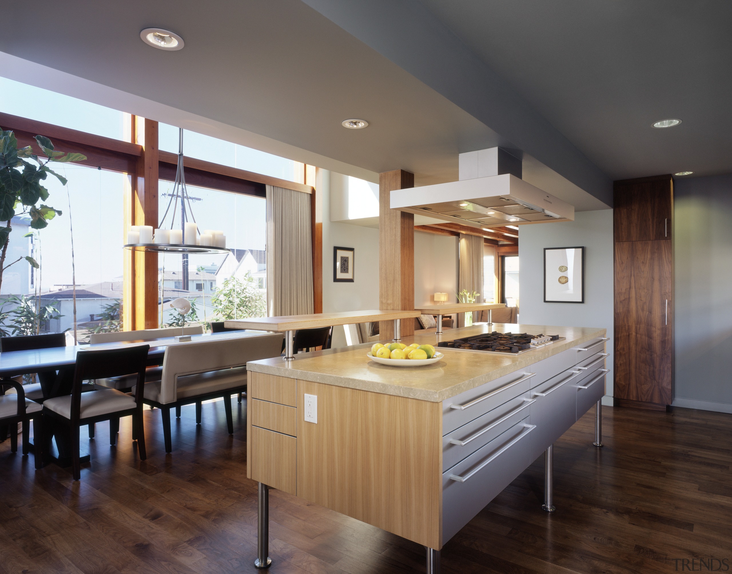 View of a kitchen and dining area which cabinetry, ceiling, countertop, cuisine classique, floor, flooring, hardwood, interior design, kitchen, room, wood flooring, gray