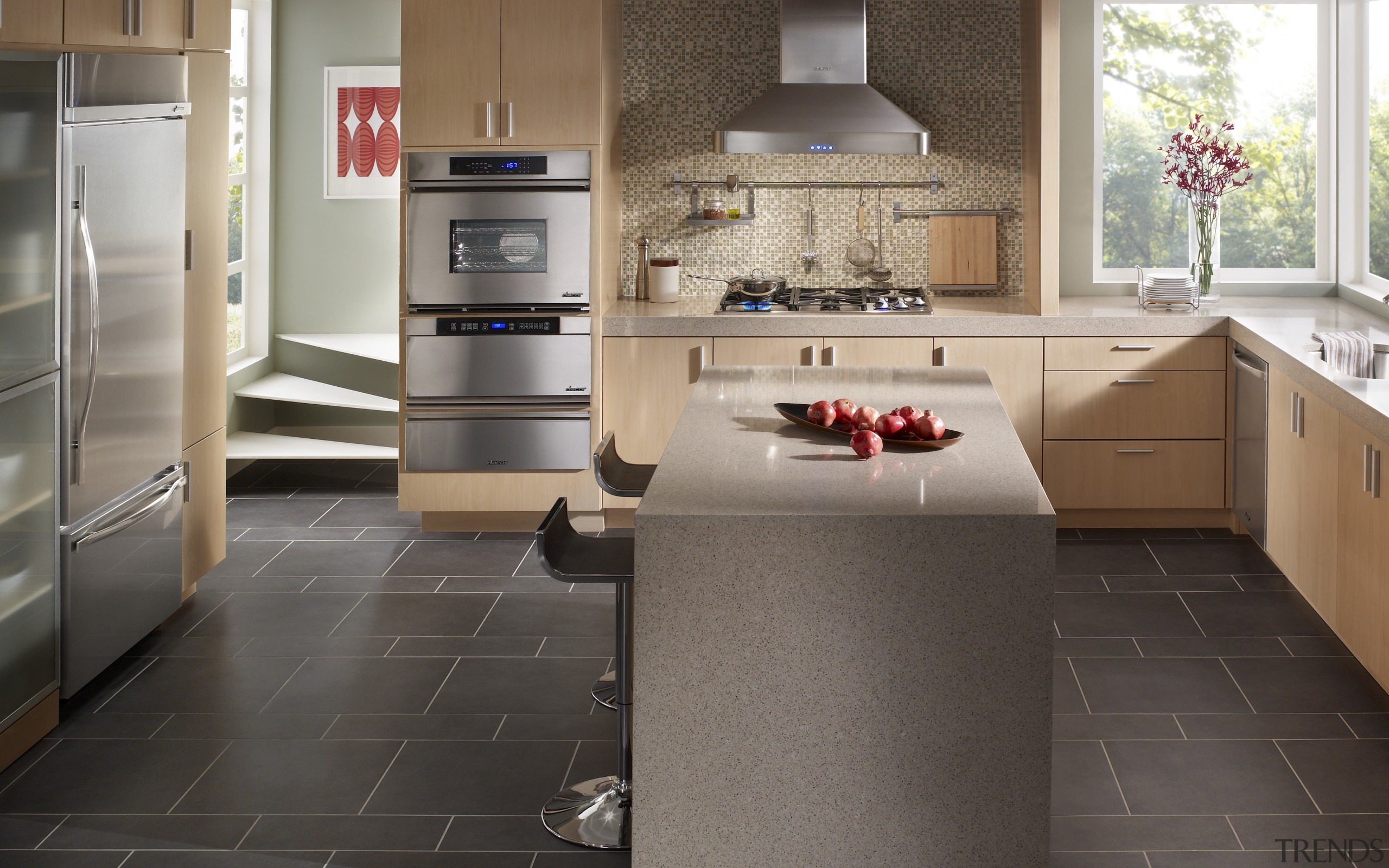 View of a family kitchen which features Dacor cabinetry, countertop, cuisine classique, floor, flooring, hardwood, home appliance, interior design, kitchen, laminate flooring, room, tile, wood flooring, gray, black