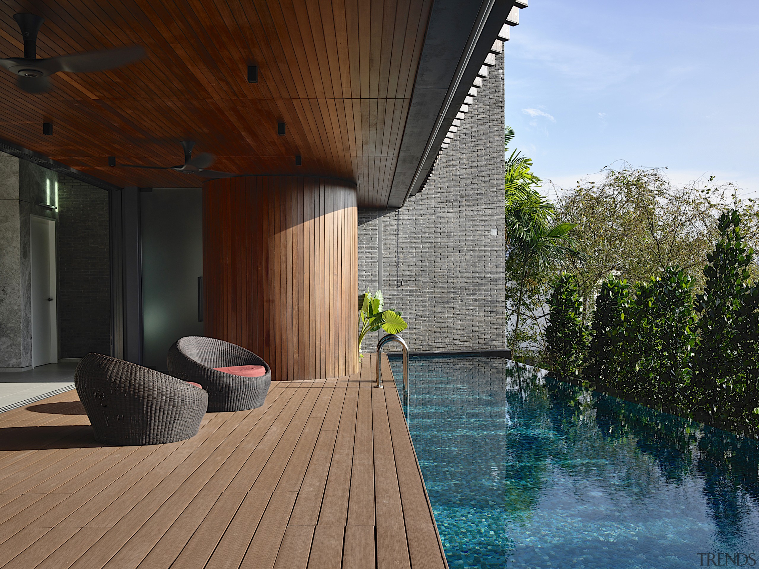 Swimming pool deck at the rear of the 