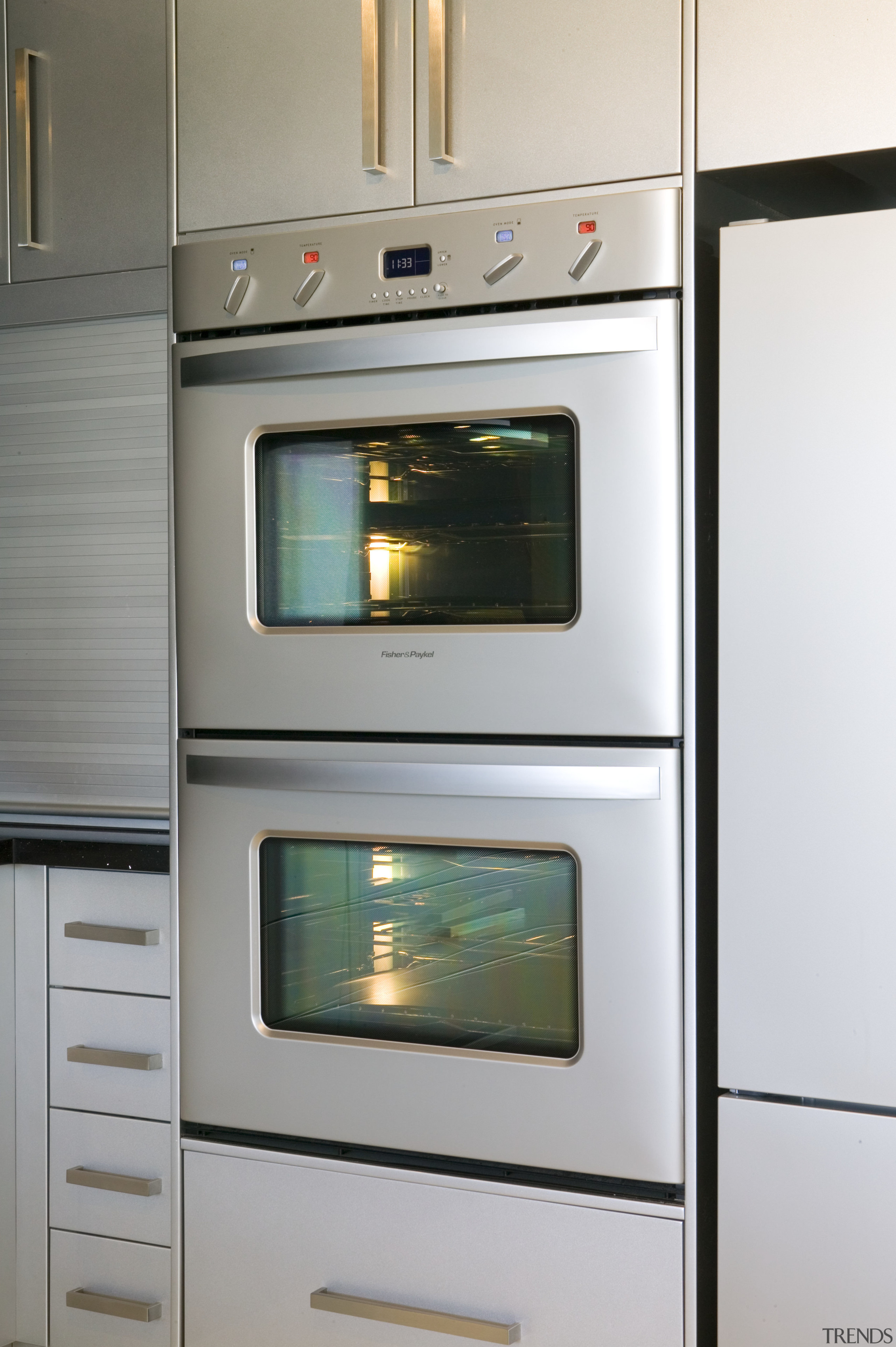 Matching controls are a feature of the Fisher home appliance, kitchen, kitchen appliance, major appliance, microwave oven, oven, product design, refrigerator, white, gray